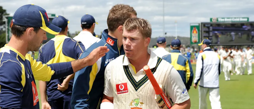 Warner is congratulated for his innings by teammate Ricky Ponting