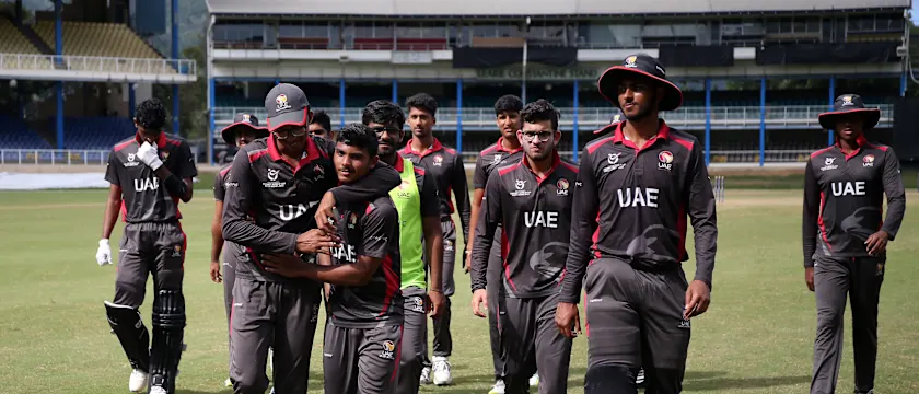 Players of United Arab Emirates celebrate following the ICC U19 Men's Cricket World Cup Plate Quarter Final 1 match between United Arab Emirates and Uganda at Queen's Park Oval on January 25, 2022 in Port of Spain, Trinidad And Tobago.