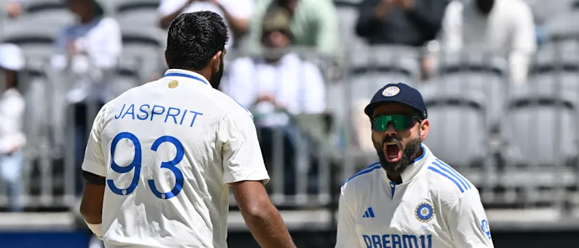 Virat Kohli celebrates with Jasprit Bumrah