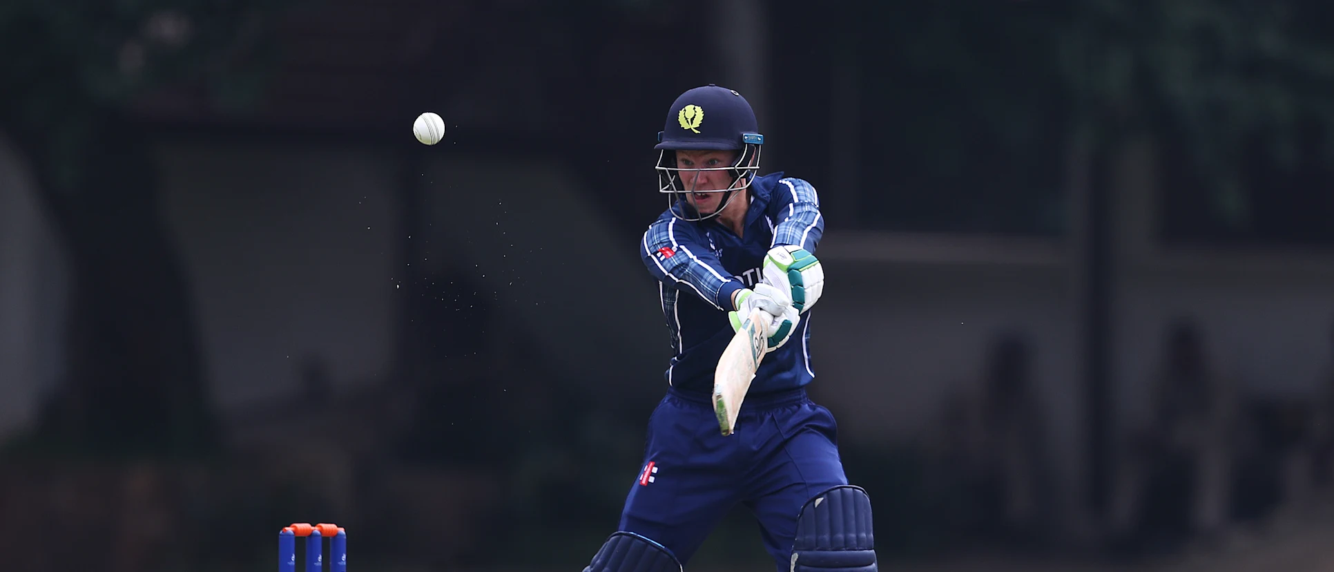 Logo of Angus Guy of Scotland edges the ball towards the boundary during the ICC U19 Cricket World Cup warm up match between Scotland and Japan at St John's College on January 13, 2020 in Johannesburg, South Africa.