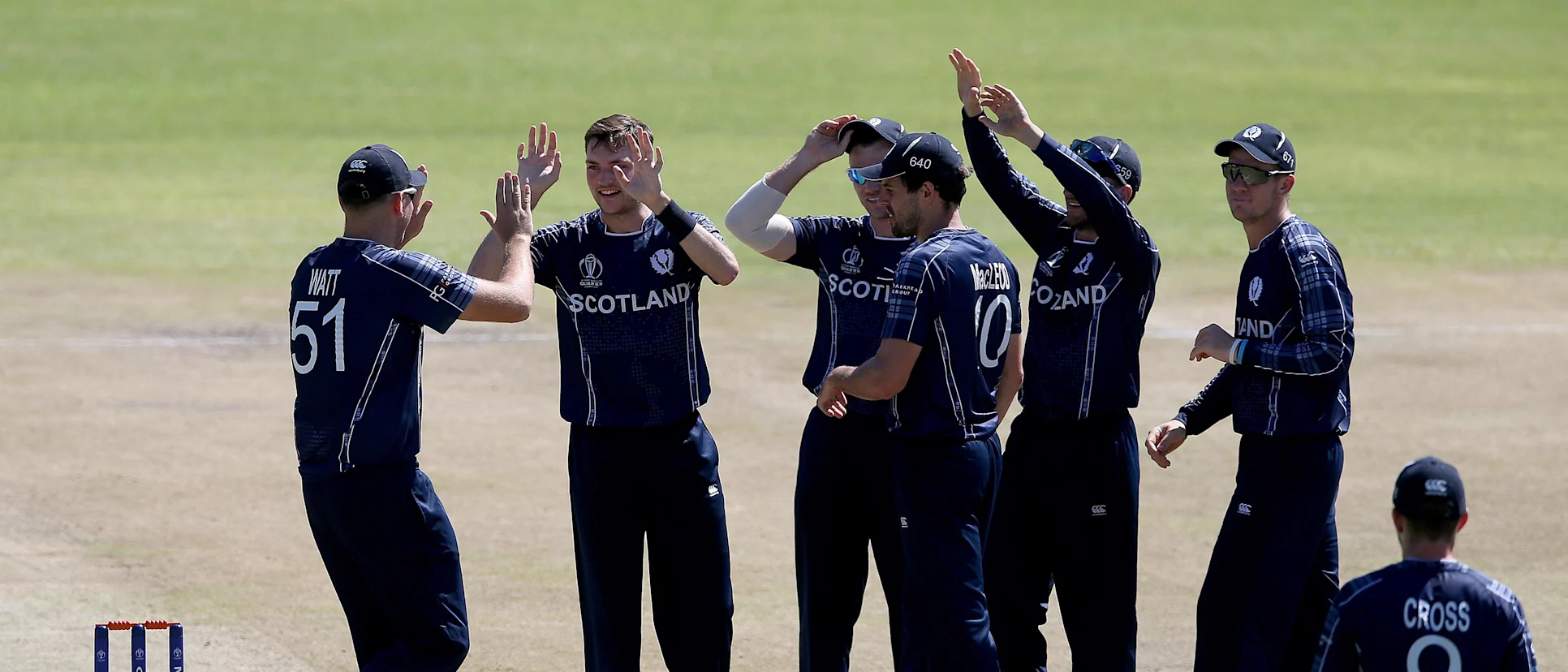 Logo of Stuart Whittingham (2ndL) of Scotland celebrates with teamates after taking the wicket of Dipendra Airee of Nepal during the ICC Cricket World Cup Qualifier between Scotland v Nepal at Queens Sports Club on March 8, 2018 in Bulawayo, Zimbabwe (©ICC).