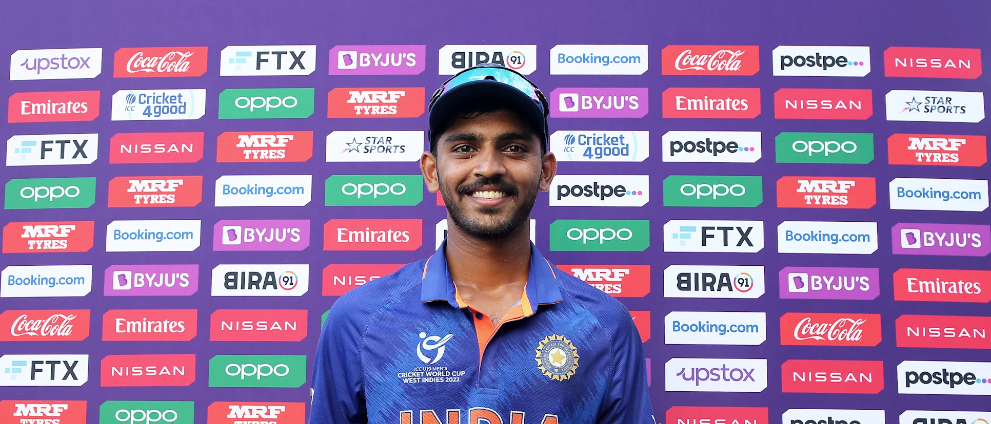 Logo of Vicky Ostwal of India poses after being named Player of the Match following the ICC U19 Men's Cricket World Cup match between India and South Africa at Providence Stadium on January 15, 2022 in Georgetown, Guyana.