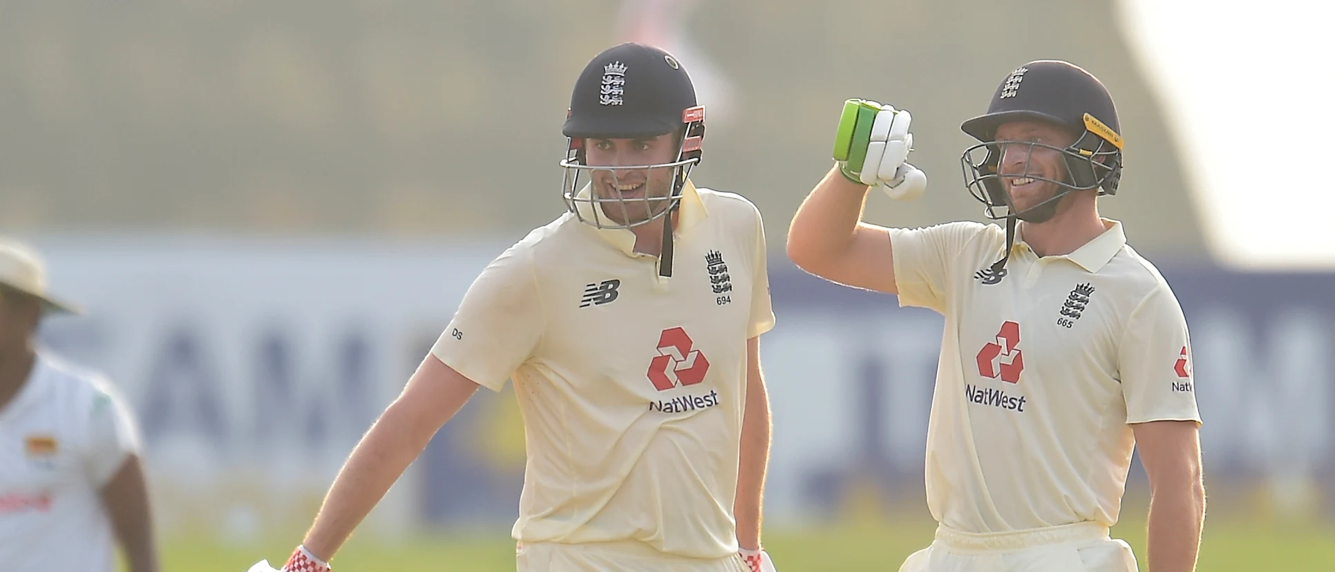 Logo of Jos Buttler and Dom Sibley celebrate the win of second test
