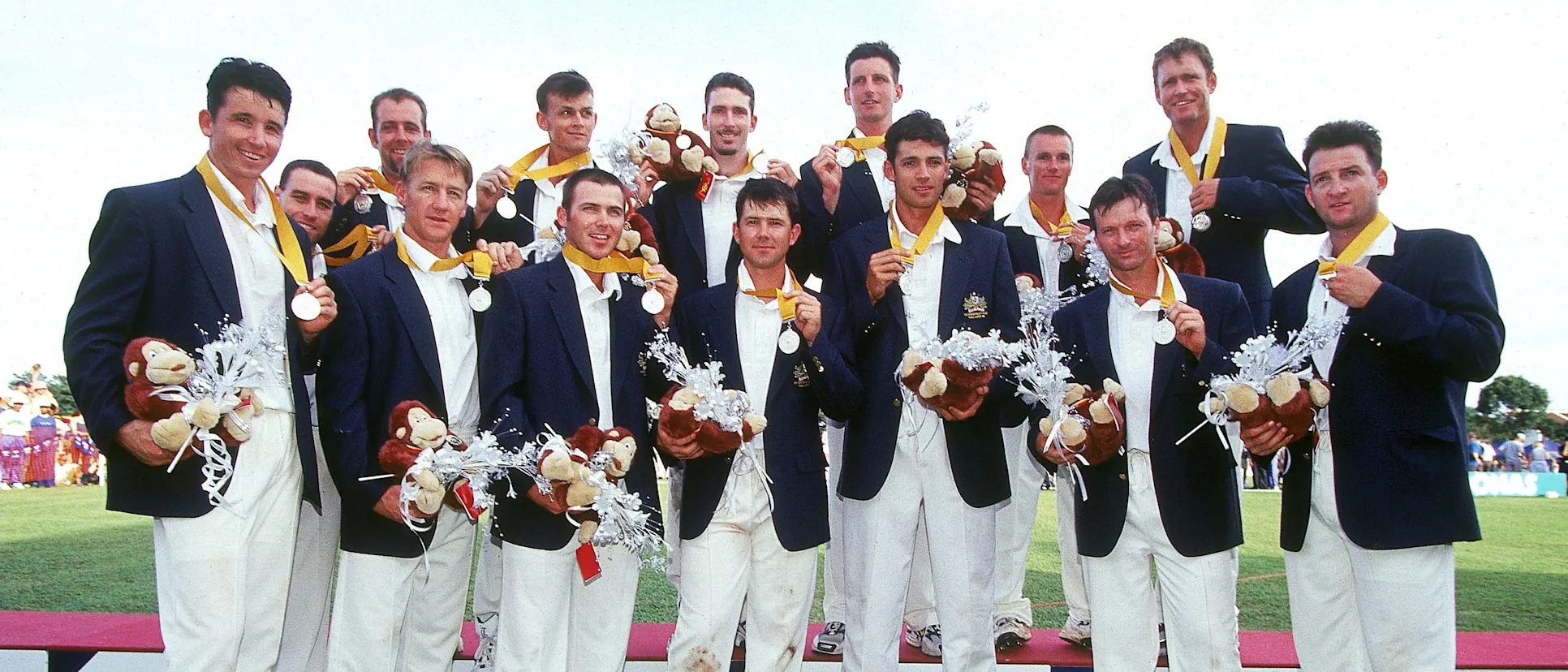 Logo of Australia players celebrate silver medal at Commonwealth Games in 1998