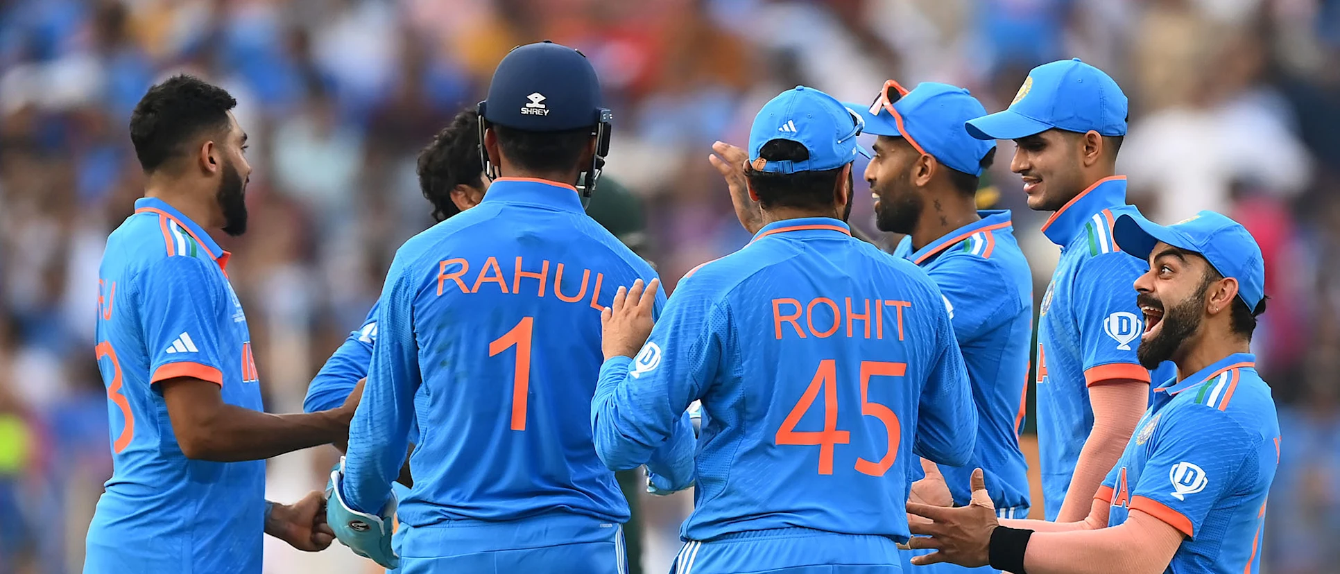 Logo of Virat Kohli and India celebrate the wicket of Haris Rauf of Pakistan during the ICC Men's Cricket World Cup India 2023 match between India and Pakistan