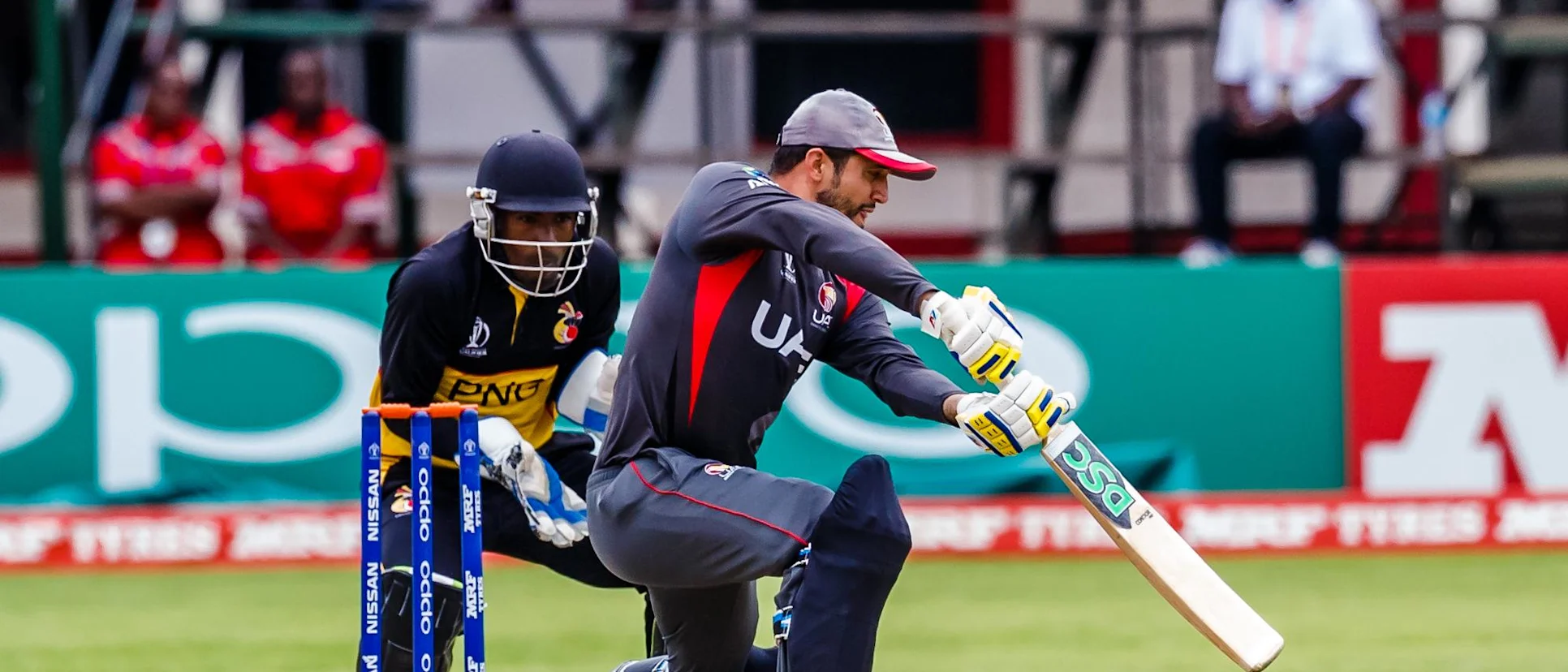 Logo of UAE captain Rohan Mustafa in action during a group A World Cup Qualifier match between Papua New Guinea and the United Arab Emirates at Harare Sports Club March 4 2018.