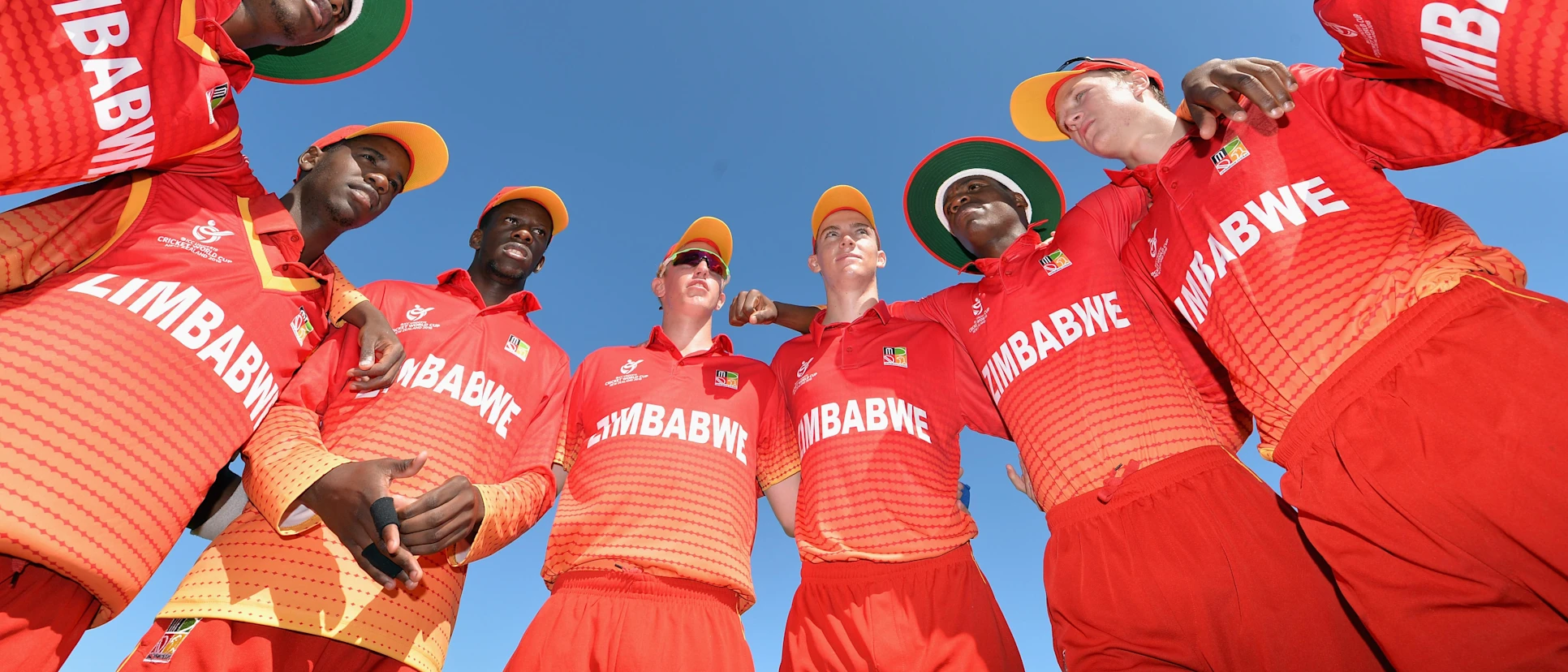 Logo of Zimbabwe U19 gather in a huddle before their first warm-up match against New Zealand.