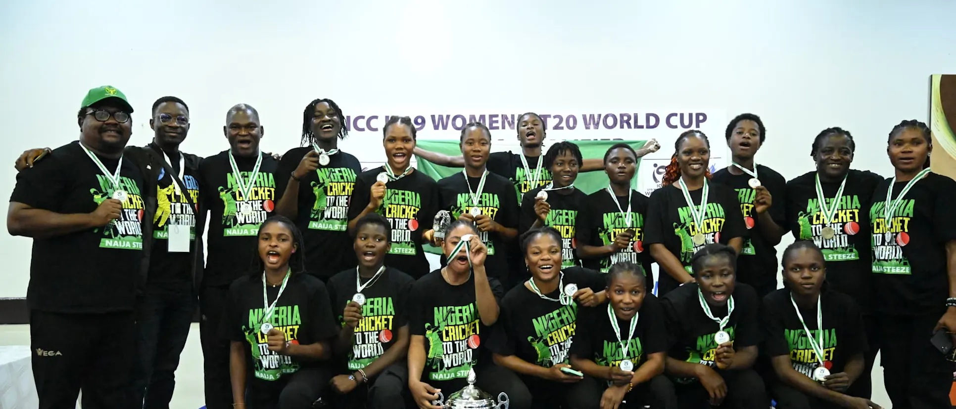 Logo of Nigeria show off their champion medals after winning the ICC U19 Women's T20 World Cup Africa Qualifier in Kigali to secure a ticket to Malaysia