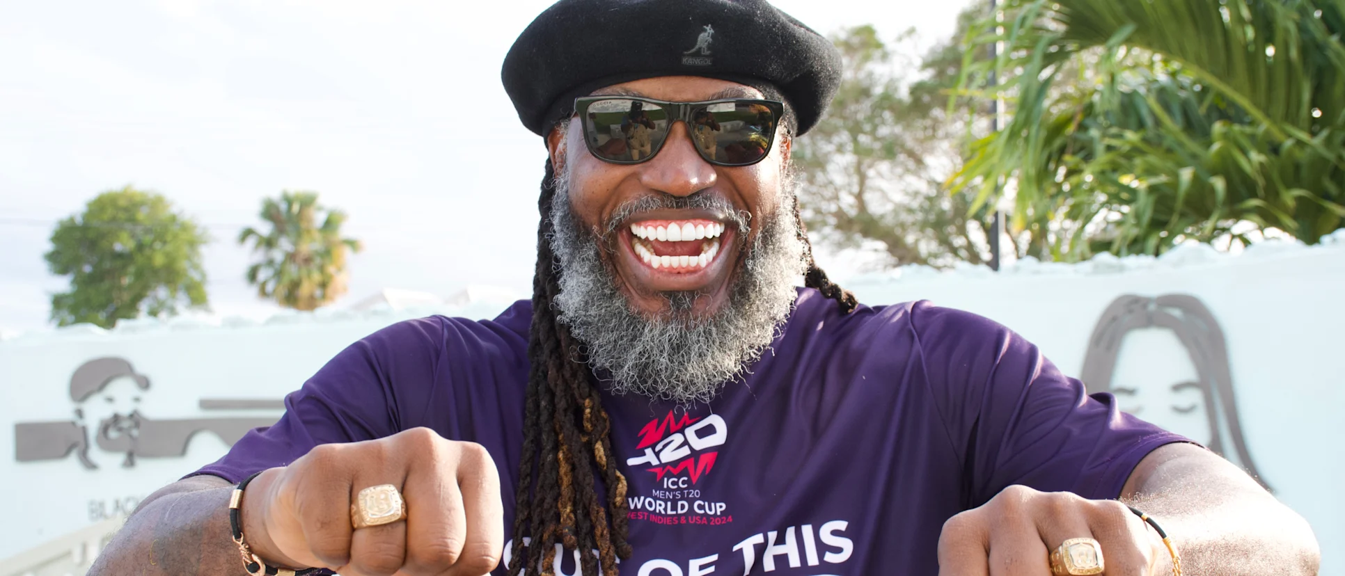 Logo of Universe Boss shows off his 2 WC rings at 100 DTG celebration in Bds