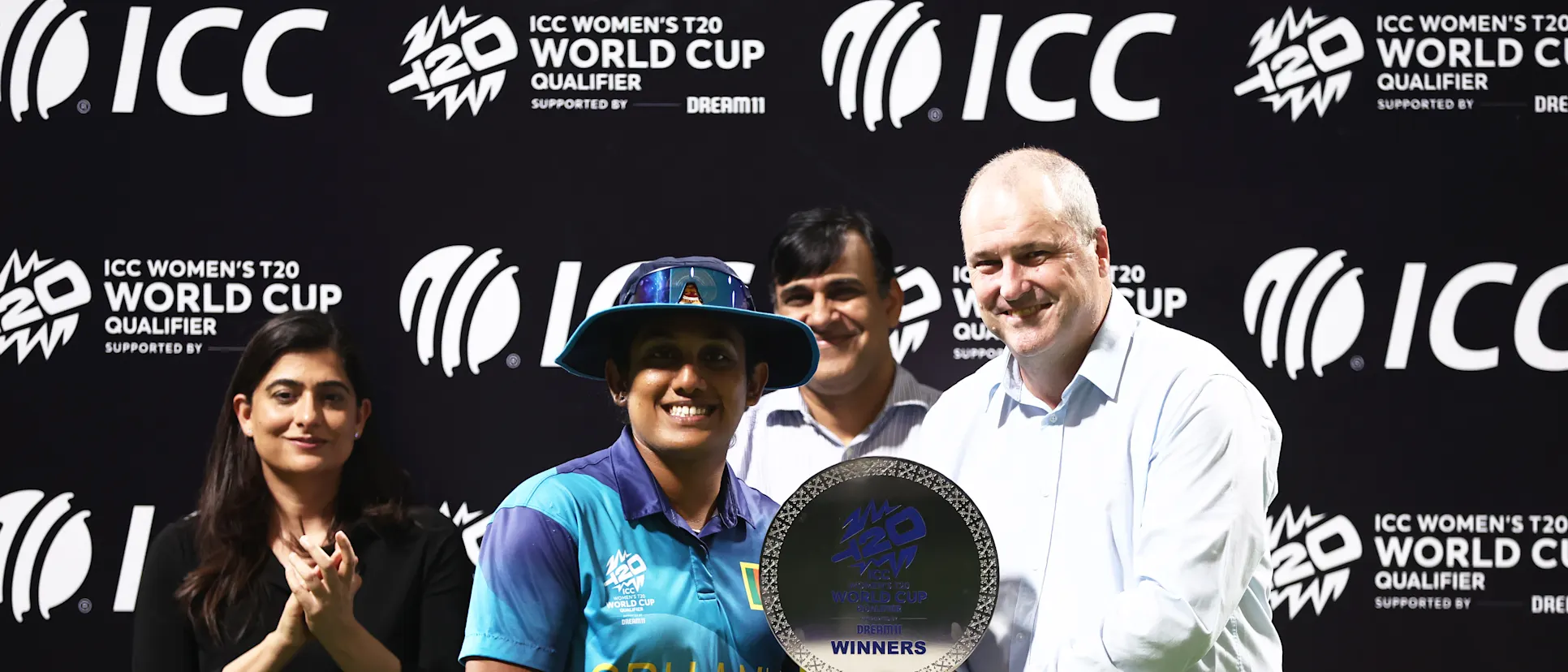 Chamari Athapaththu of Sri Lanka poses with the ICC Women's T20 World Cup Qualifier 2024 Trophy following the ICC Women's T20 World Cup Qualifier 2024 Final match between Scotland and Sri Lanka at Zayed Cricket Stadium on May 07, 2024 in Abu Dhabi, United Arab Emirates.