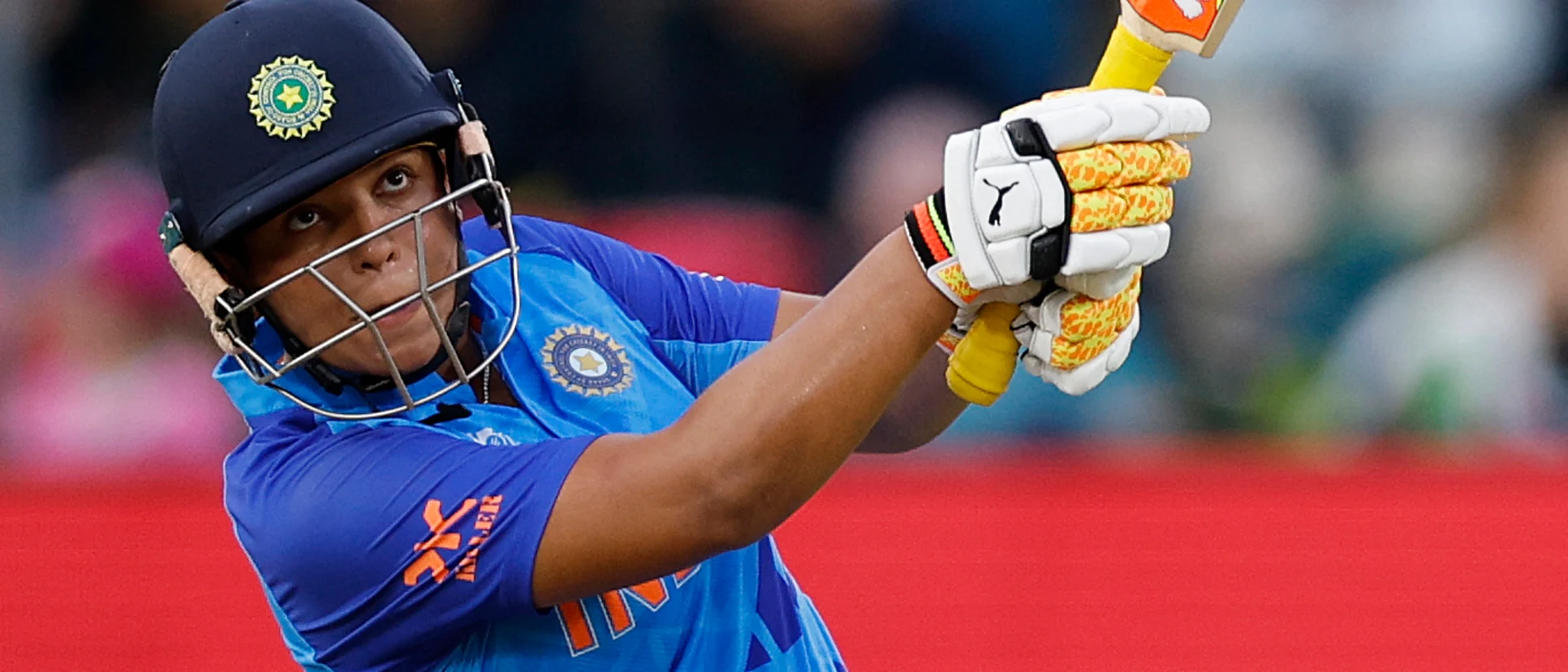 Logo of India's Richa Ghosh hits a six during the Group B T20 women's World Cup cricket match between England and India at St George's Park in Gqeberha on February 18, 2023.