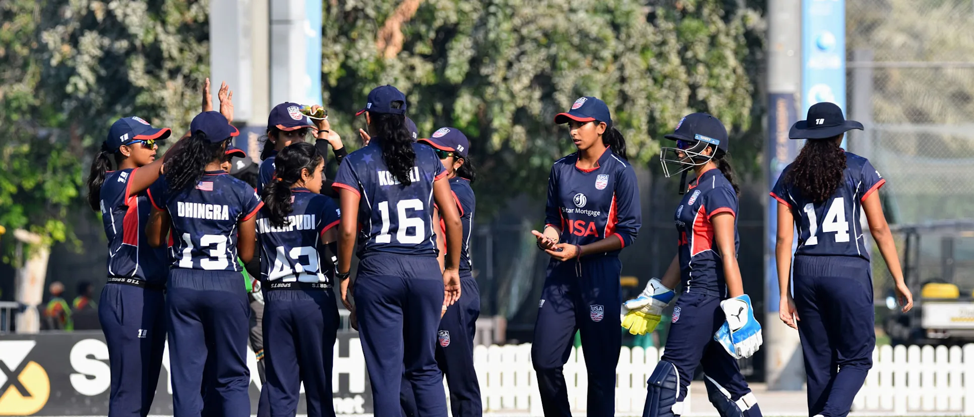 Logo of USA Under 19 players celebrate a wicket during the UAE series // USA Cricket