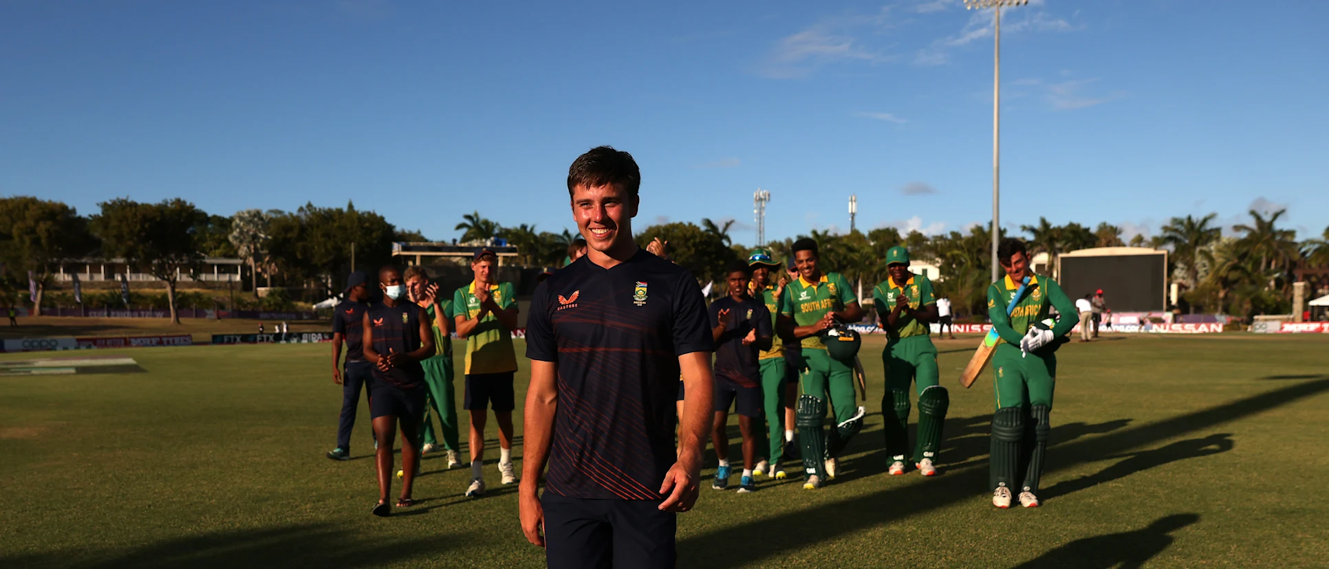 Logo of Brevis leads South Africa from the field following a victory