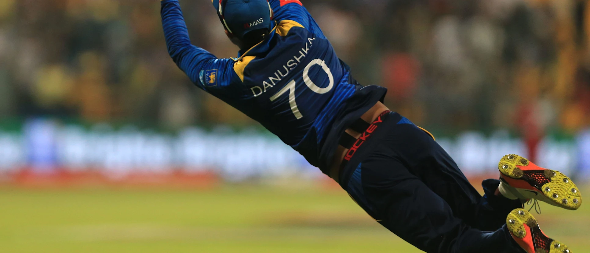 Gunathilaka dives for a catch