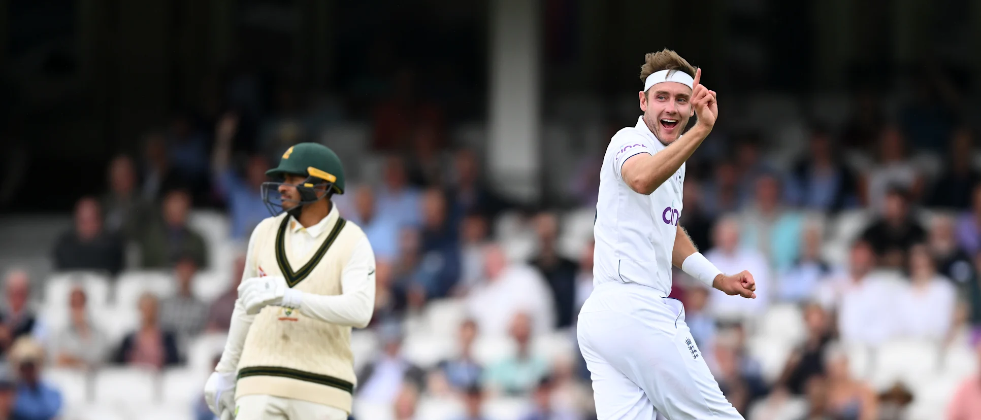 Stuart Broad celebrates after taking the wicket of Usman Khawaja