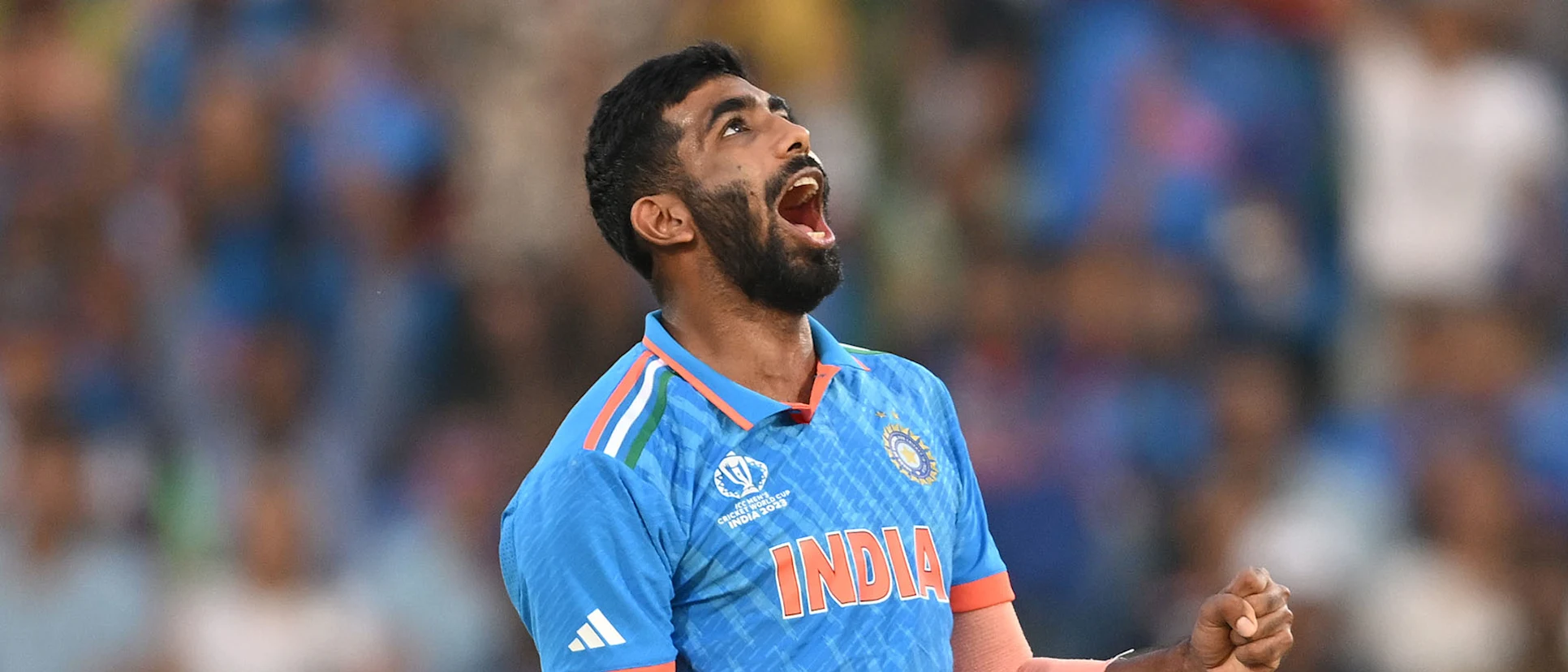 Logo of Jasprit Bumrah of India celebrates the wicket of Mohammad Nabi of Afghanistan during the ICC Men's Cricket World Cup India 2023 between India and Afghanistan (2)