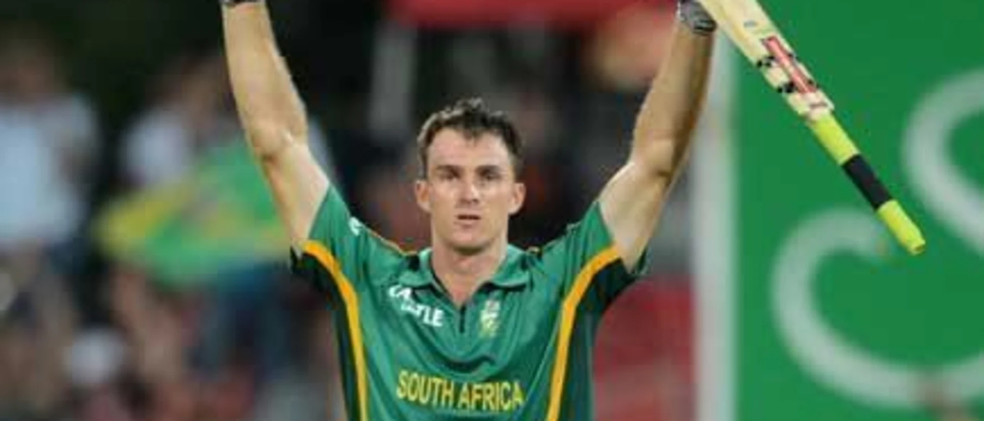 Logo of 41677 Ryan McLaren celebrates after hitting the six