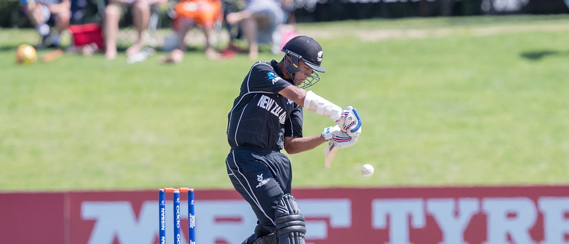 Logo of Rachin Ravindra of New Zealand batting
