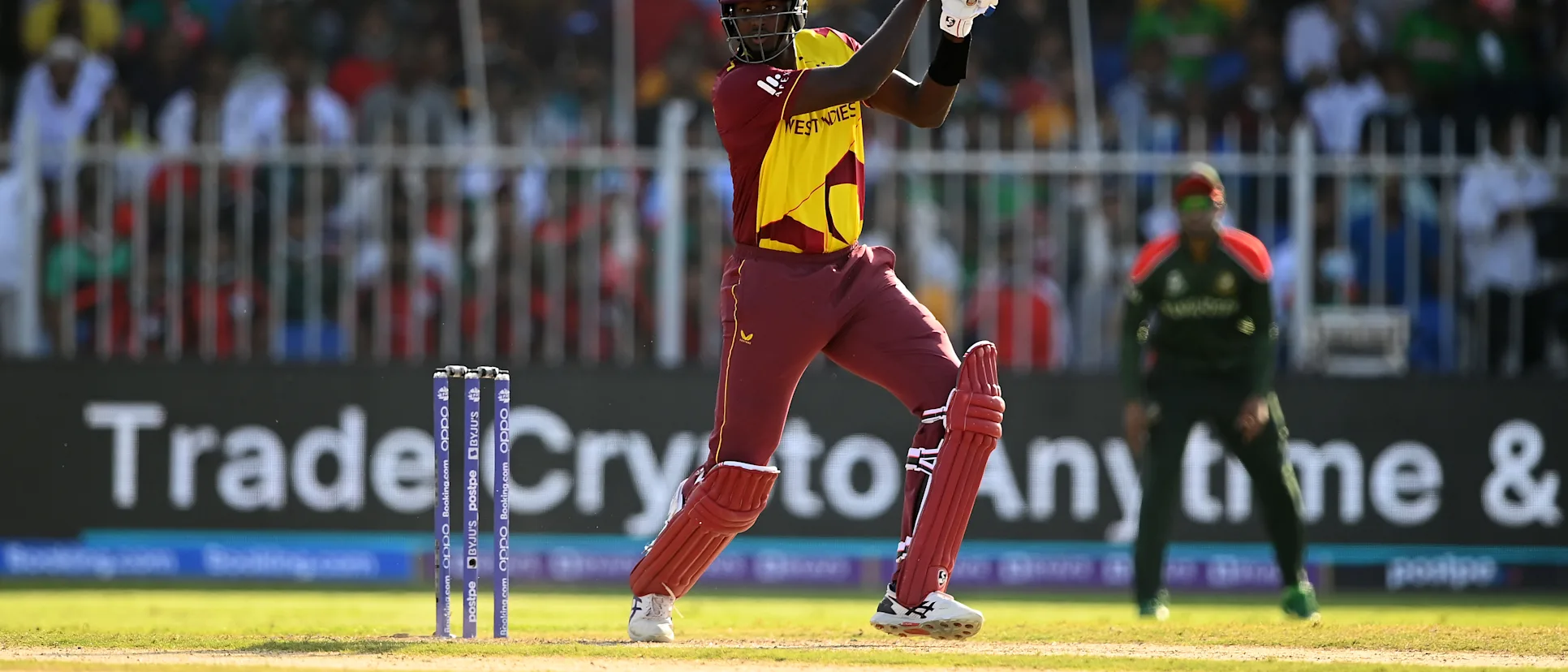 Jason Holder of West Indies plays a shot during the ICC Men's T20 World Cup match between West Indies and Bangladesh at Sharjah Cricket Stadium on October 29, 2021 in Sharjah, United Arab Emirates.