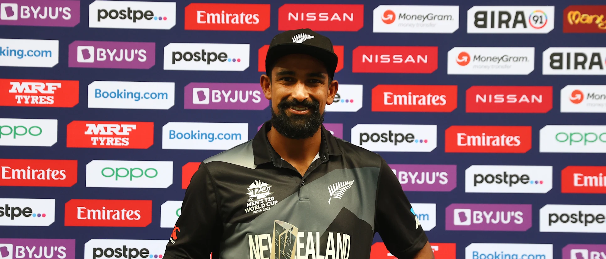 Logo of Ish Sodhi of New Zealand poses with the player of the match award after the ICC Men's T20 World Cup match between India and NZ at Dubai International Stadium on October 31, 2021 in Dubai, United Arab Emirates.