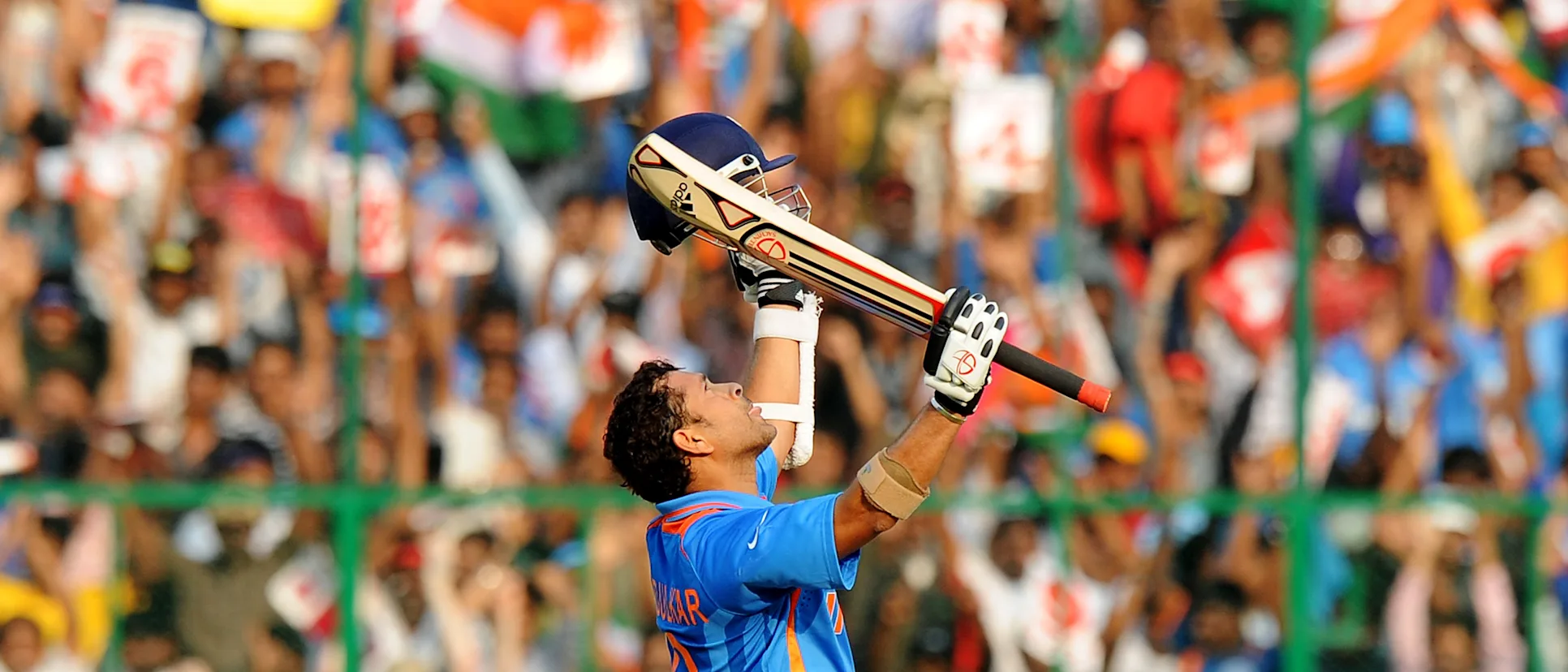 Sachin Tendulkar celebrates his century against England.