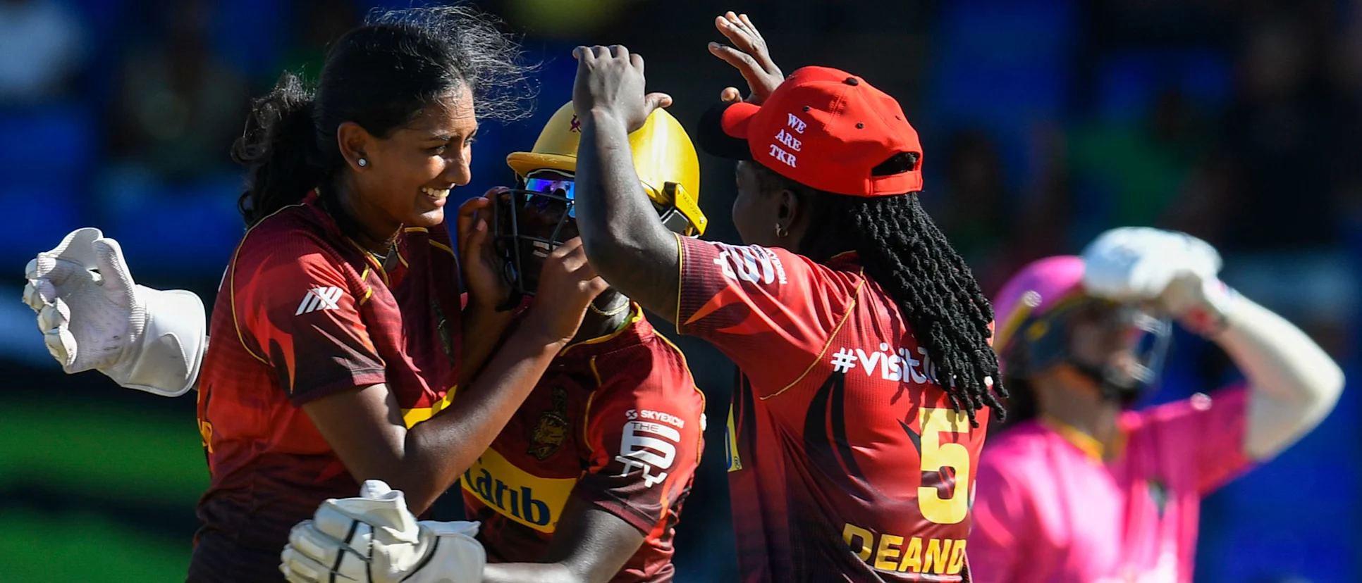 Logo of Kodali (left) celebrates a wicket in the Caribbean Premier League