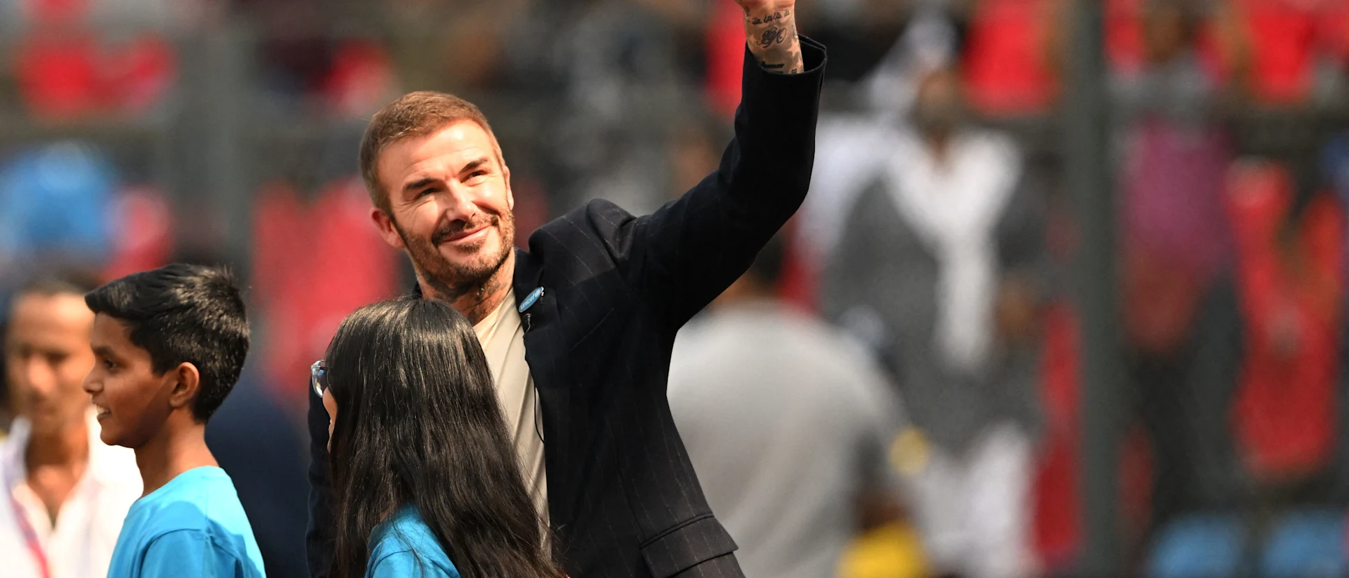 Logo of David Beckham greets fans in Mumbai