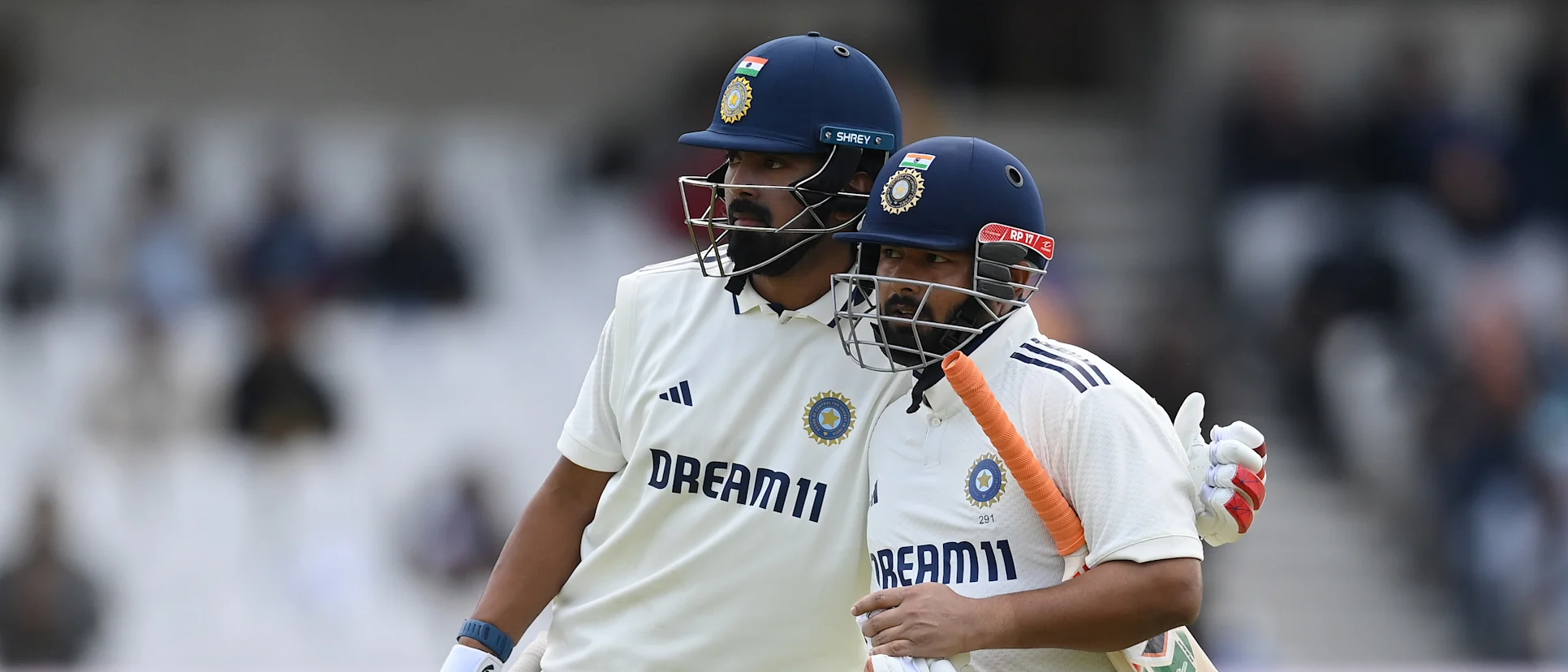 Logo of Rishabh Pant and KL Rahul embrace after a defying stand