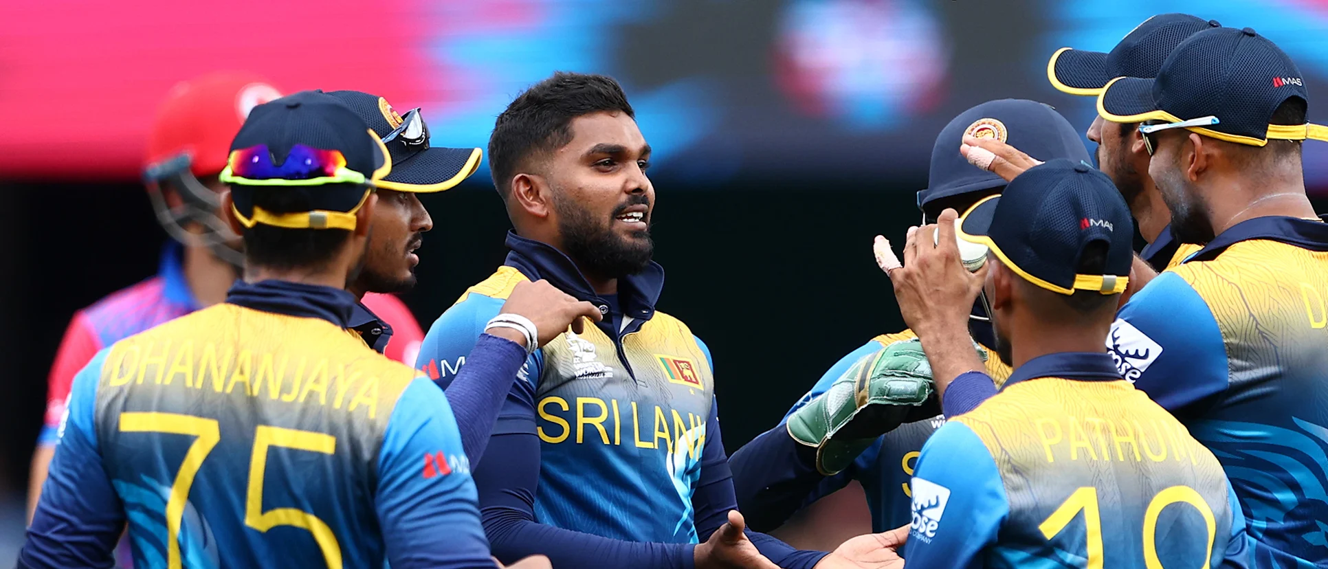 Logo of Wanindu Hasaranga of Sri Lanka celebrates after taking the wicket of Usman Ghani of Afghanistan during the ICC Men's T20 World Cup match between Afghanistan and Sri Lanka