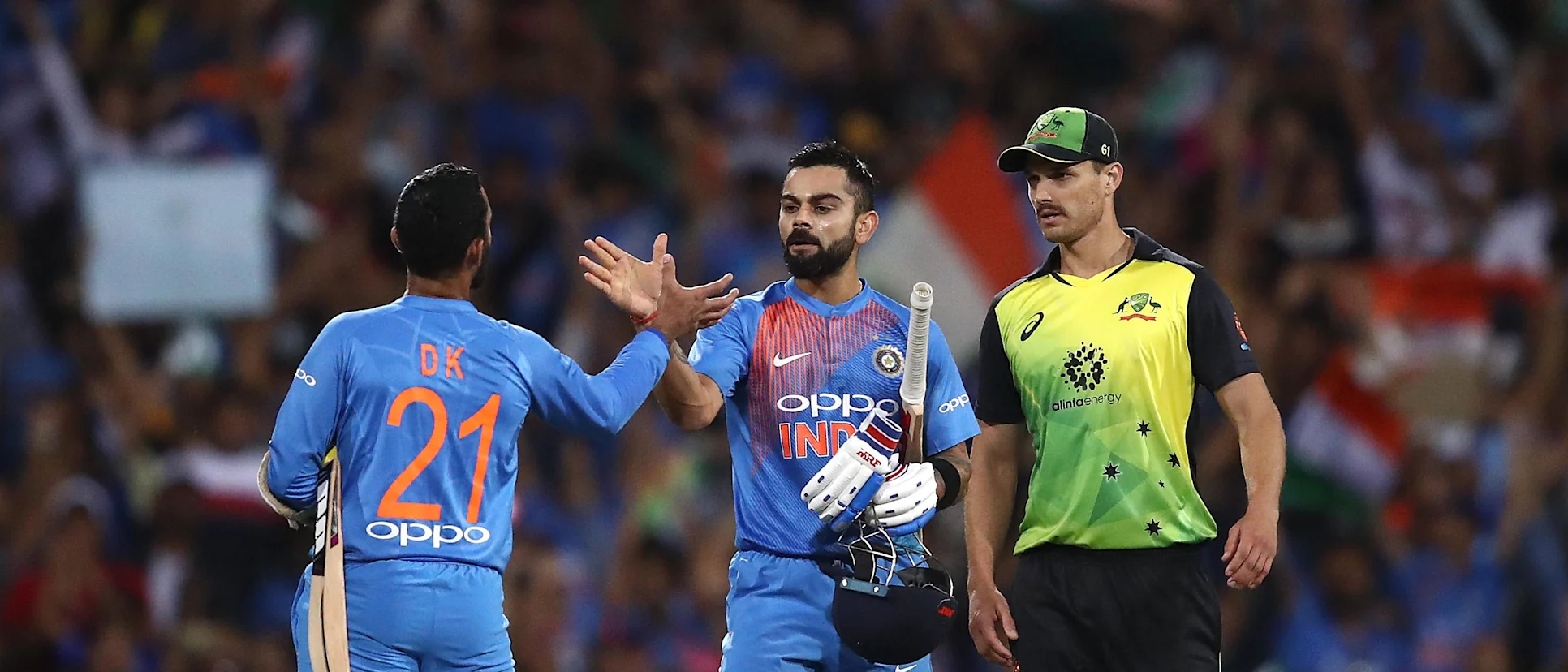 Logo of Kohli and Karthik celebrate victory