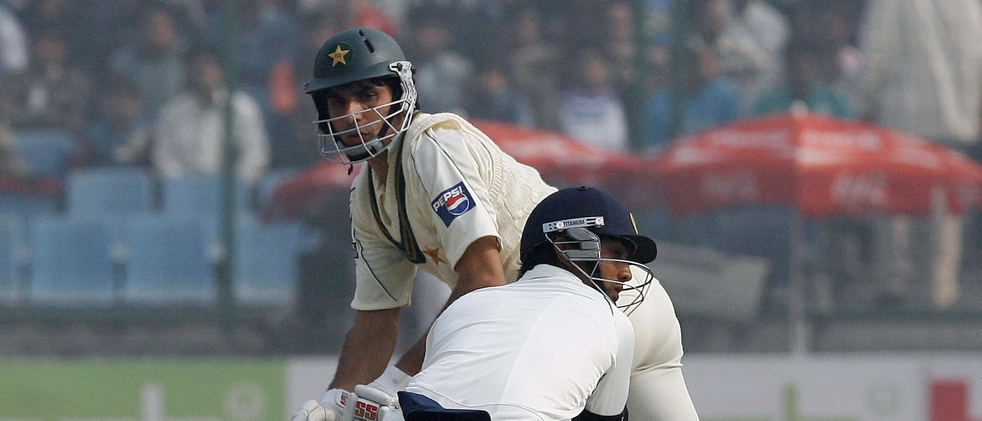 Logo of Misbah's 82 helped Pakistan cross the 200-mark against India in Delhi
