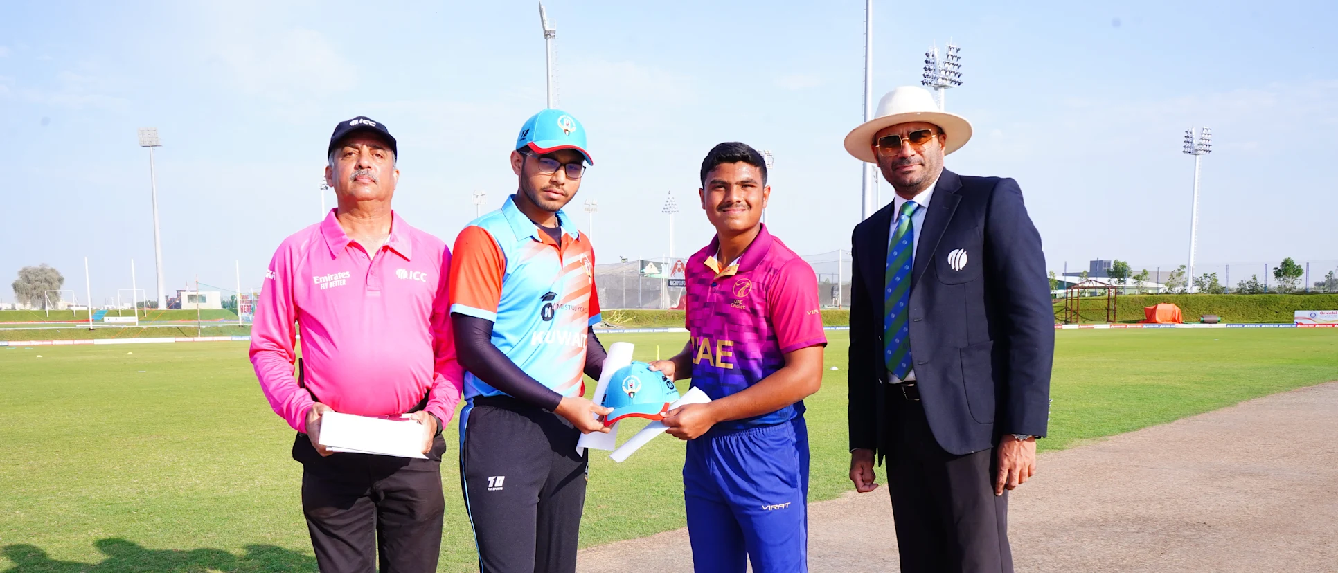 Logo of The captains of UAE and Kuwait at the ICC Under-19 Men’s Cricket World Cup Asia Qualifier