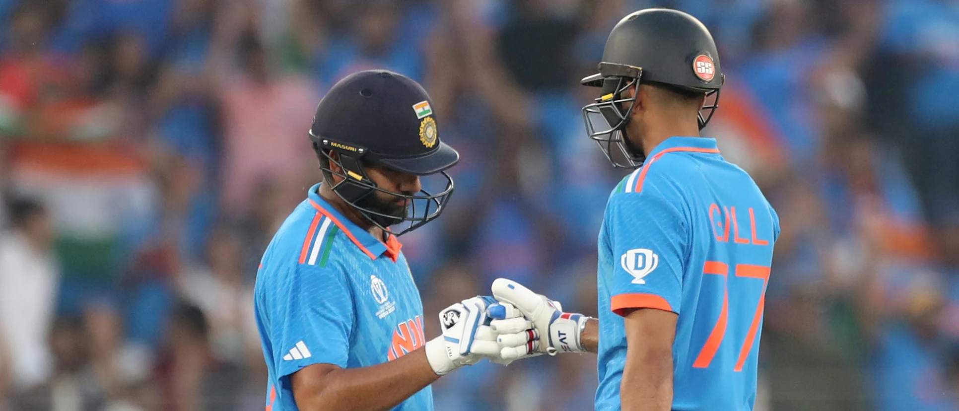 Logo of Rohit Sharma and Shubman Gill of India react during the ICC Men's Cricket World Cup India 2023 between India and Pakistan