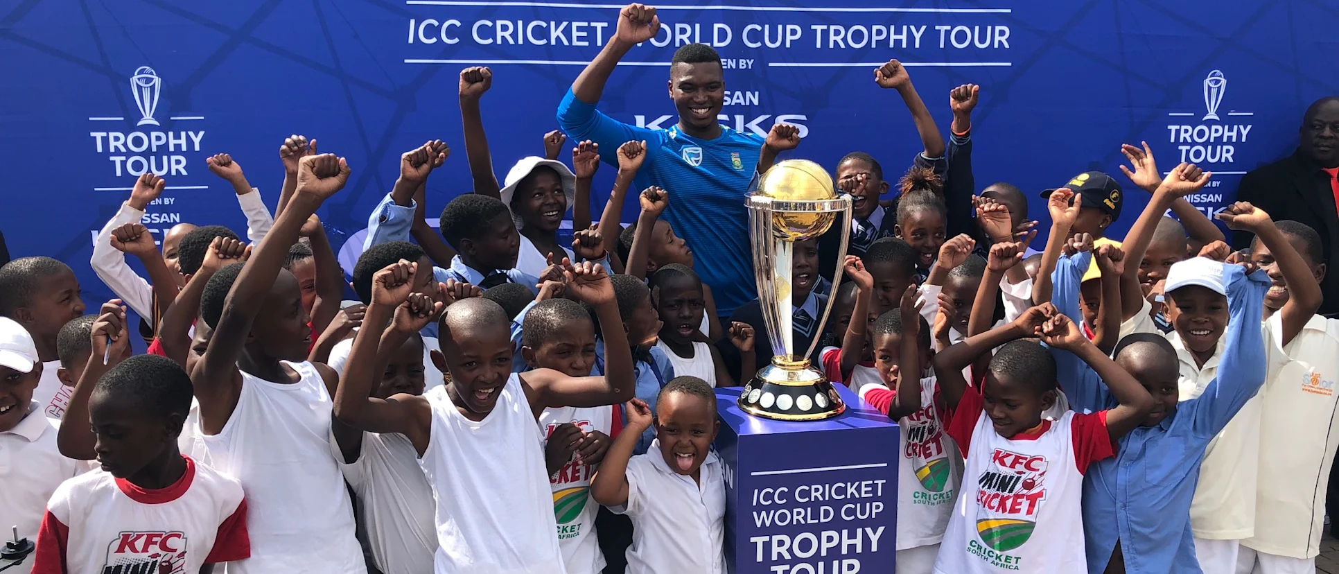 Logo of South Africa pacer Lungi Ngidi met local children during the ICC Cricket World Cup Trophy Tour, driven by Nissan, at Hector Pieterson Memorial