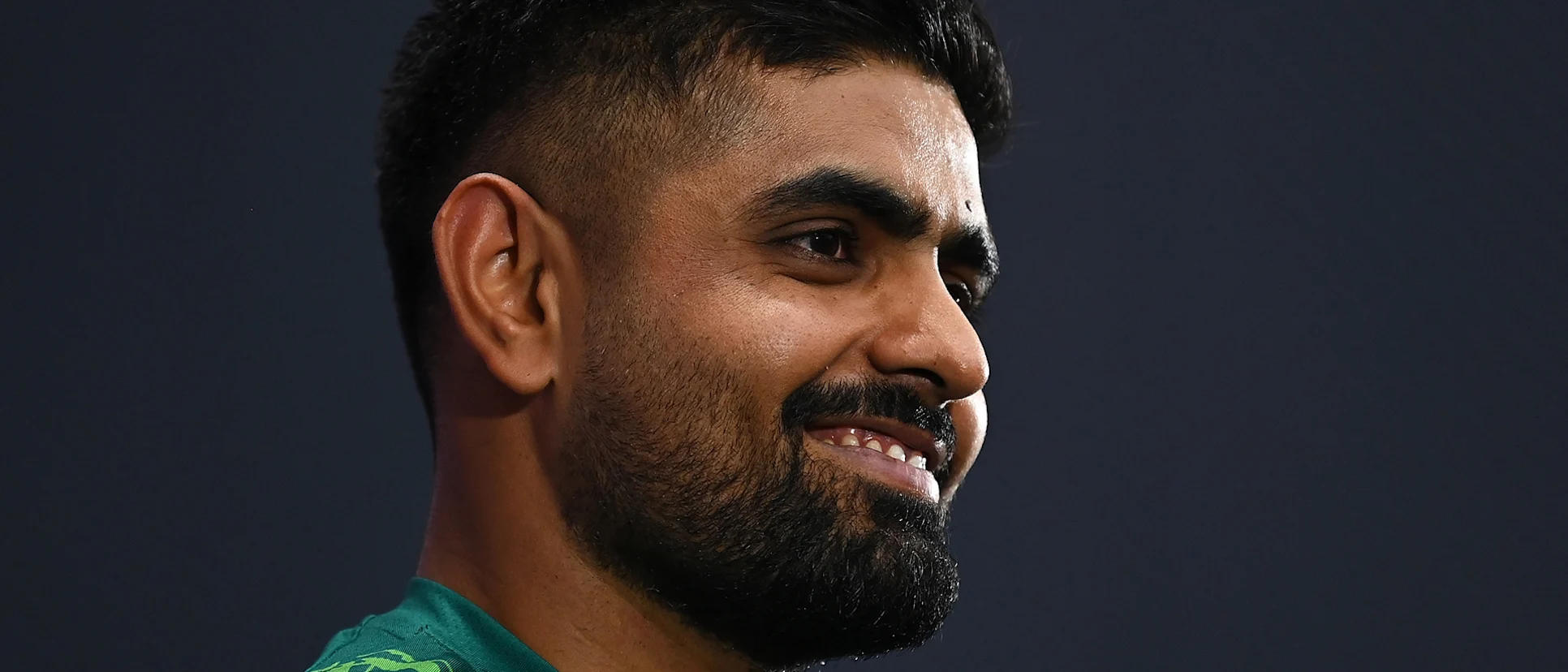 Logo of Babar Azam of Pakistan looks on as they are interviewed during the ICC Men's Cricket World Cup India 2023 India & Pakistan Net Sessions at Narendra Modi Stadium