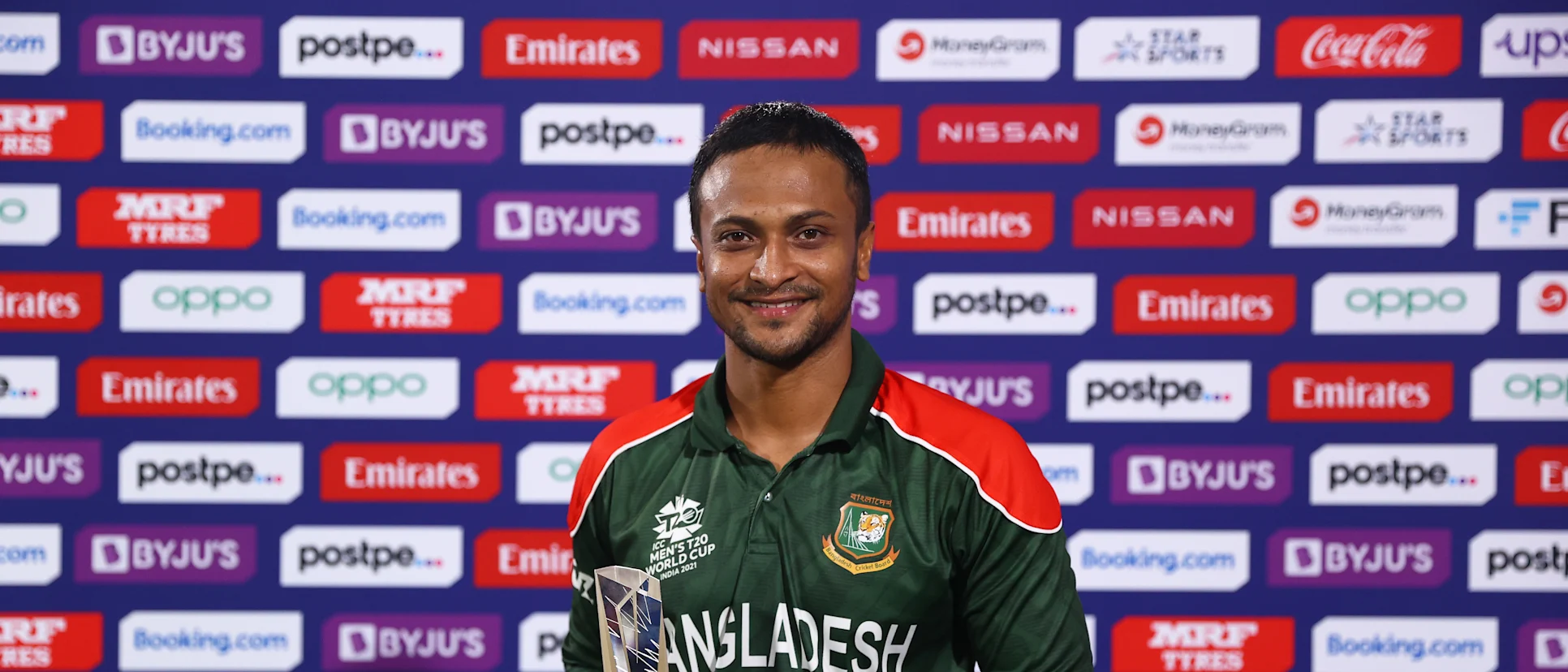 Logo of Shakib Al Hasan of Bangladesh poses after being named Player of the Match following the ICC Men's T20 World Cup match between Bangladesh and Oman at Oman Cricket Academy Ground on October 19, 2021 in Muscat, Oman.