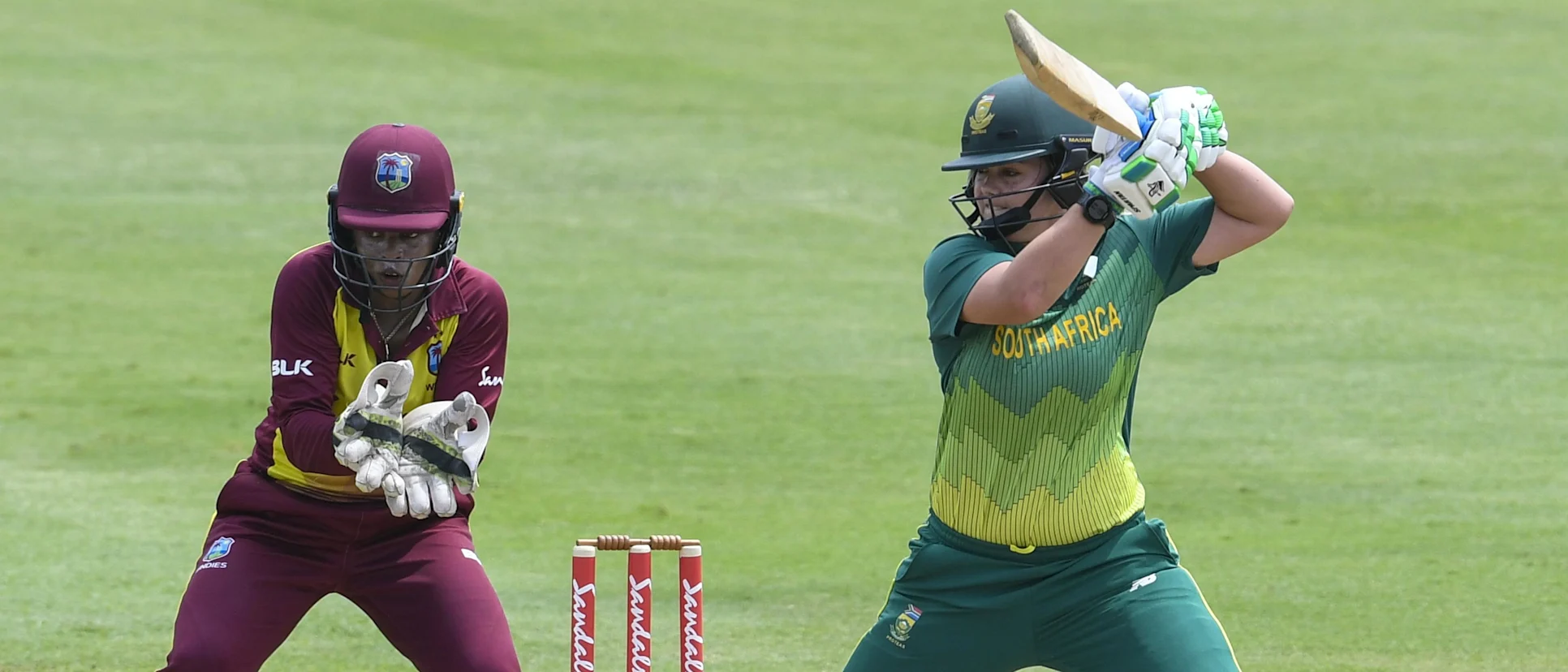 Logo of Merissa Aguilleira watches Dane van Niekerk drive into the off-side