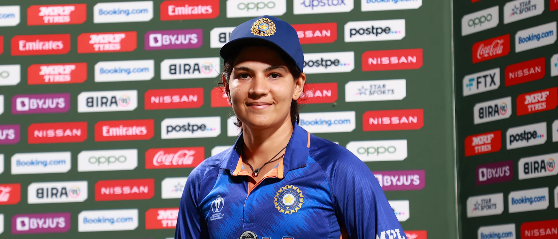 Logo of Player of the Match Yastika Bhatia of India poses for photographs after her team's victory in the 2022 ICC Women's Cricket World Cup match between India and Bangladesh at Seddon Park on March 22, 2022 in Hamilton, New Zealand.