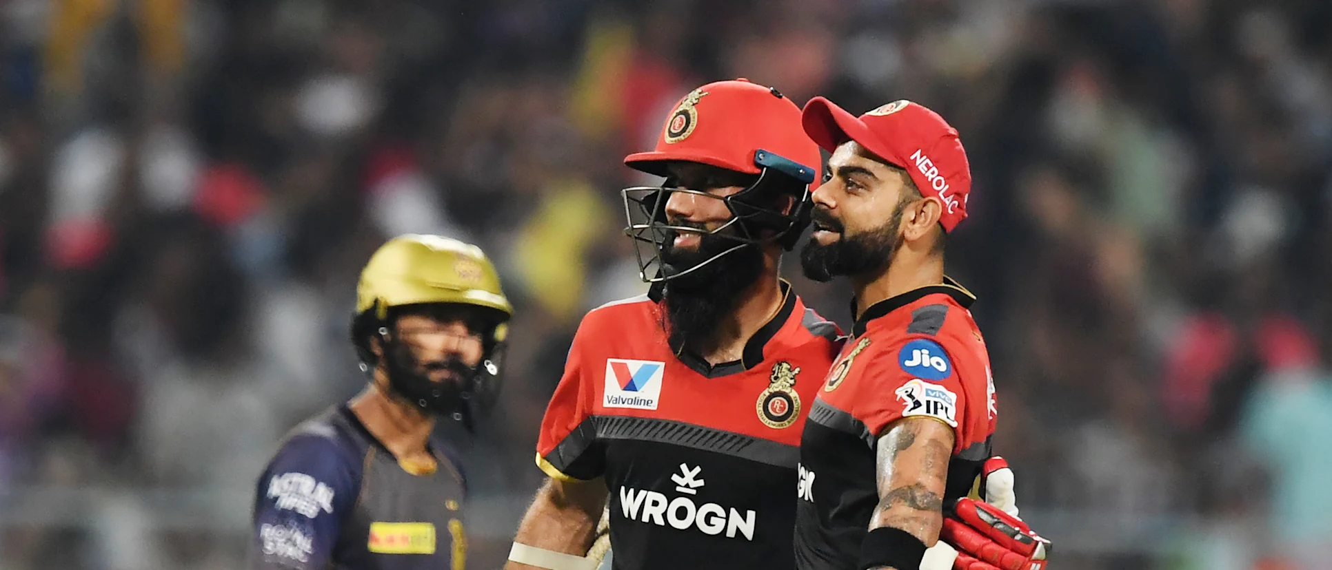 Logo of Kohli and Moeen Ali