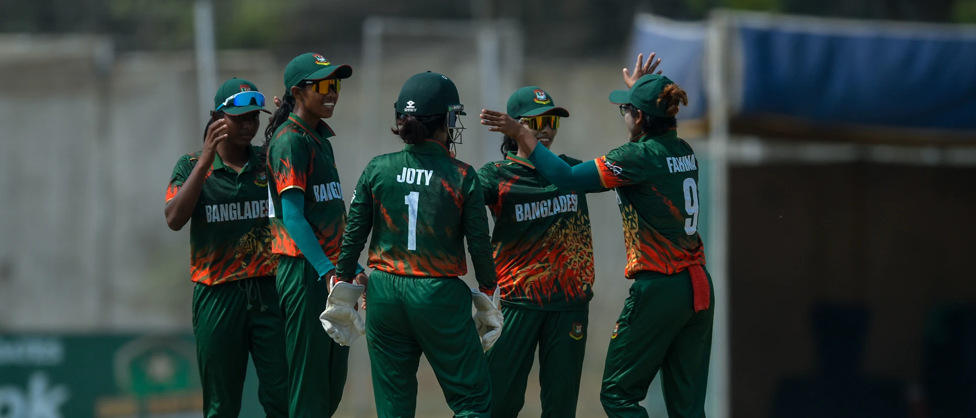 Logo of Bangladesh players celebrate wicket of Qiana Joseph