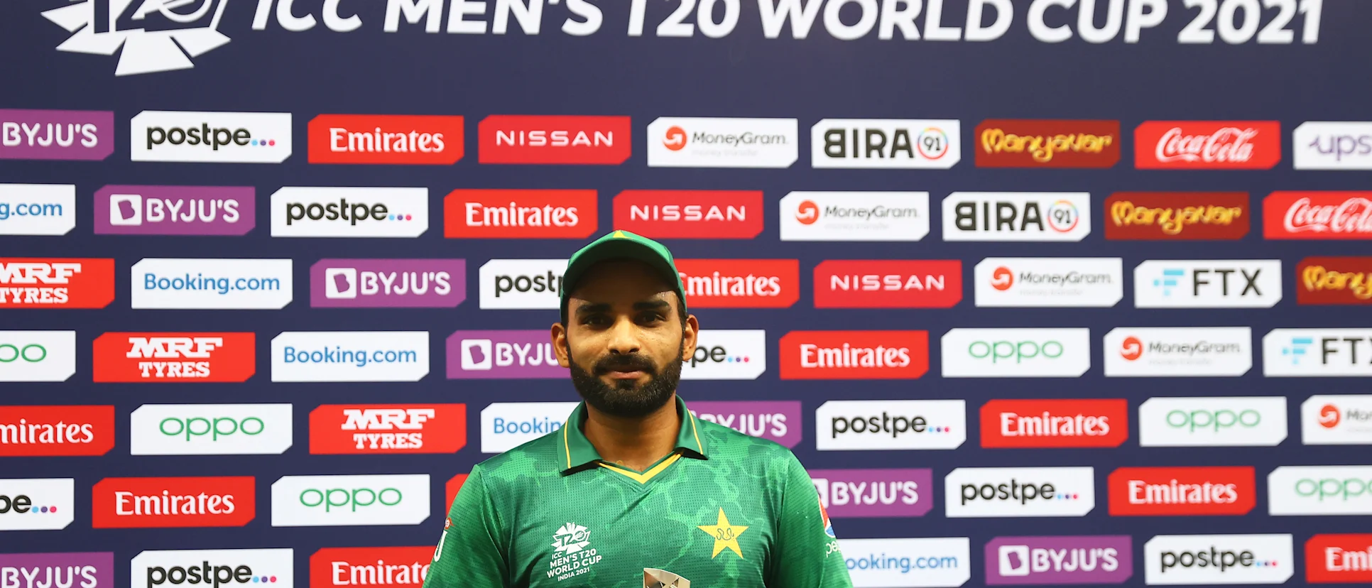Logo of Asif Ali of Pakistan poses after being named Player of the Match following the ICC Men's T20 World Cup match between Pakistan and Afghanistan at Dubai International Stadium on October 29, 2021 in Dubai, United Arab Emirates.