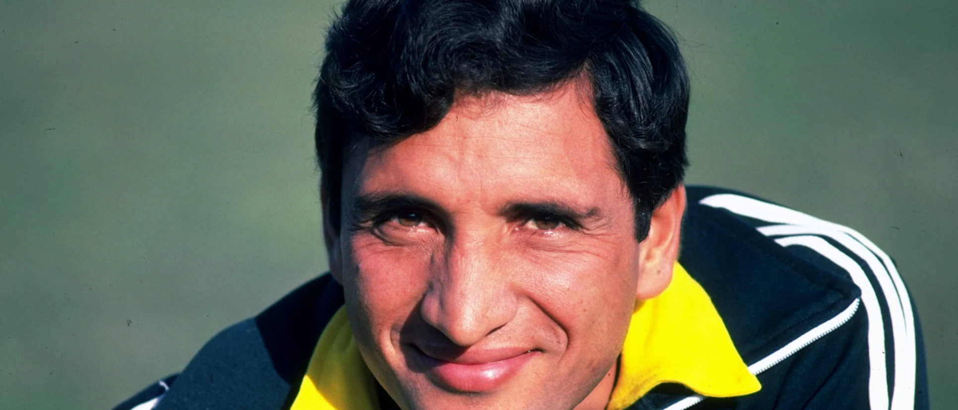 Logo of Abdul Qadir poses for a picture in 1980