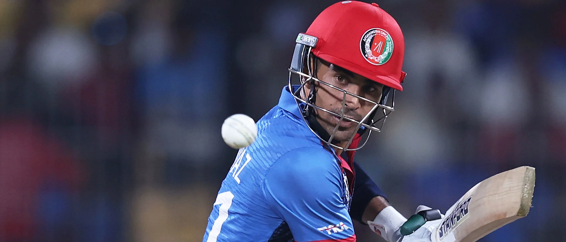 Logo of Rahmanullah Gurbaz of Afghanistan plays a shot during the ICC Men's Cricket World Cup India 2023 between Pakistan and Afghanistan
