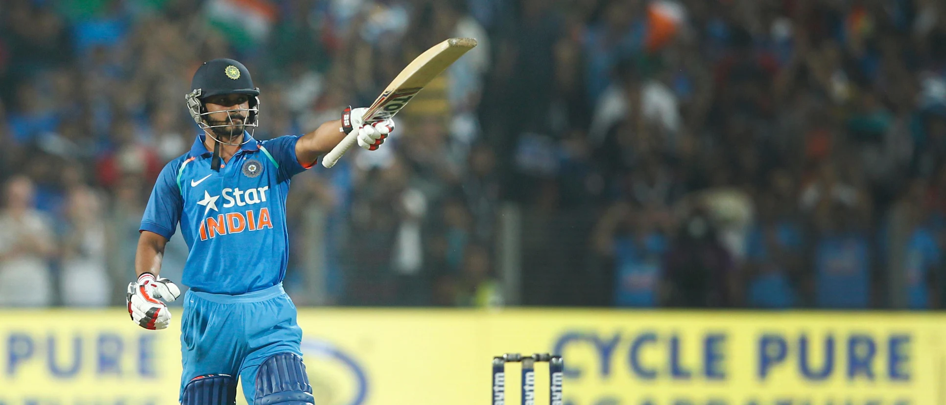 Kedar Jadhav celebrates his century against England in Pune