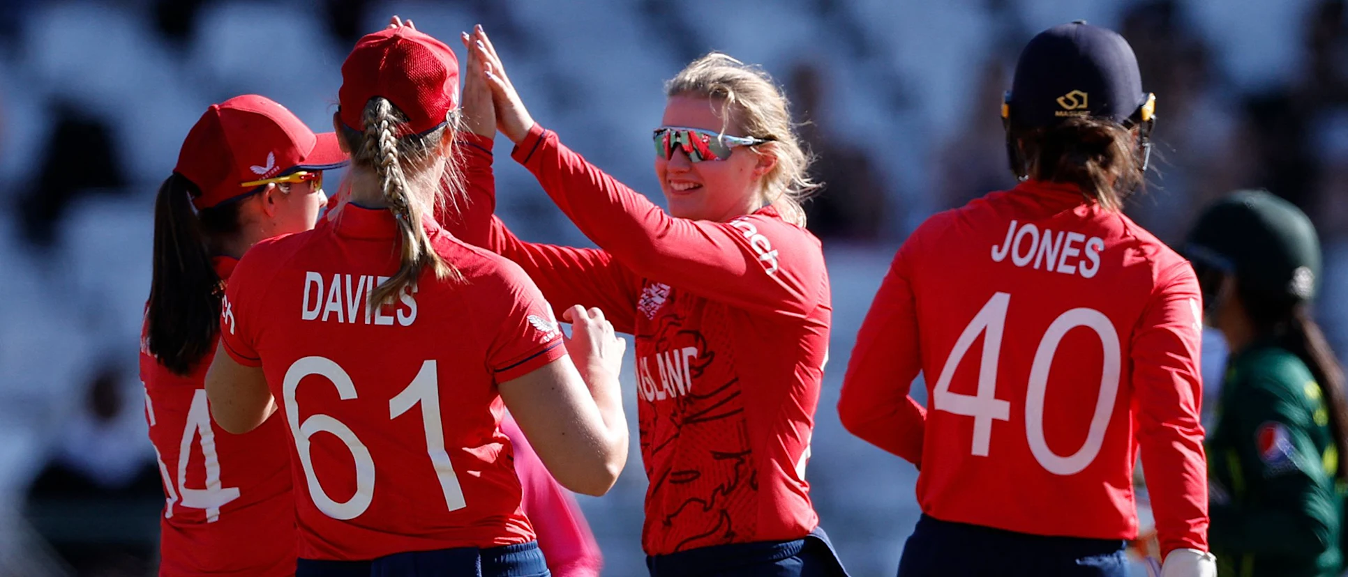 Logo of England's Charlie Dean celebrates with teammates after the dismissal of Pakistan's Muneeba Ali during the Group B T20 women's World Cup cricket match between England and Pakistan 1920x1080