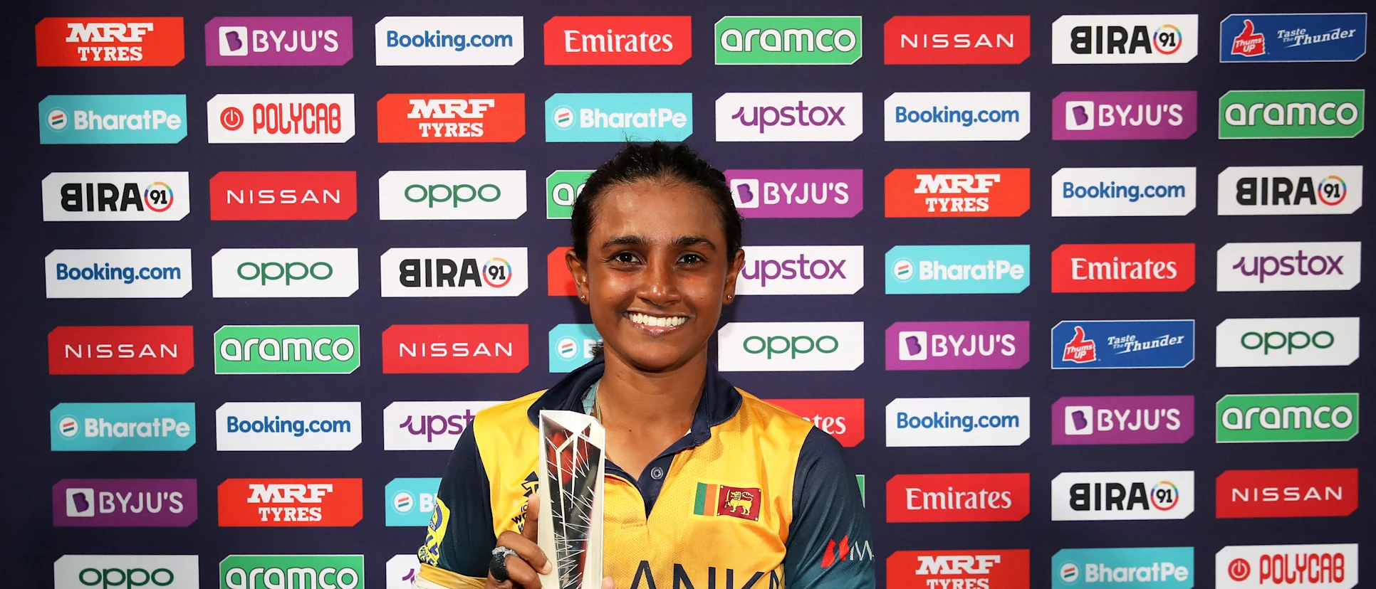 Logo of Harshitha Samarawickrama of Sri Lanka poses after being named Player of the Match following the ICC Women's T20 World Cup group A match between Bangladesh and Sri Lanka at Newlands Stadium on February 12, 2023 in Cape Town, South Africa.
