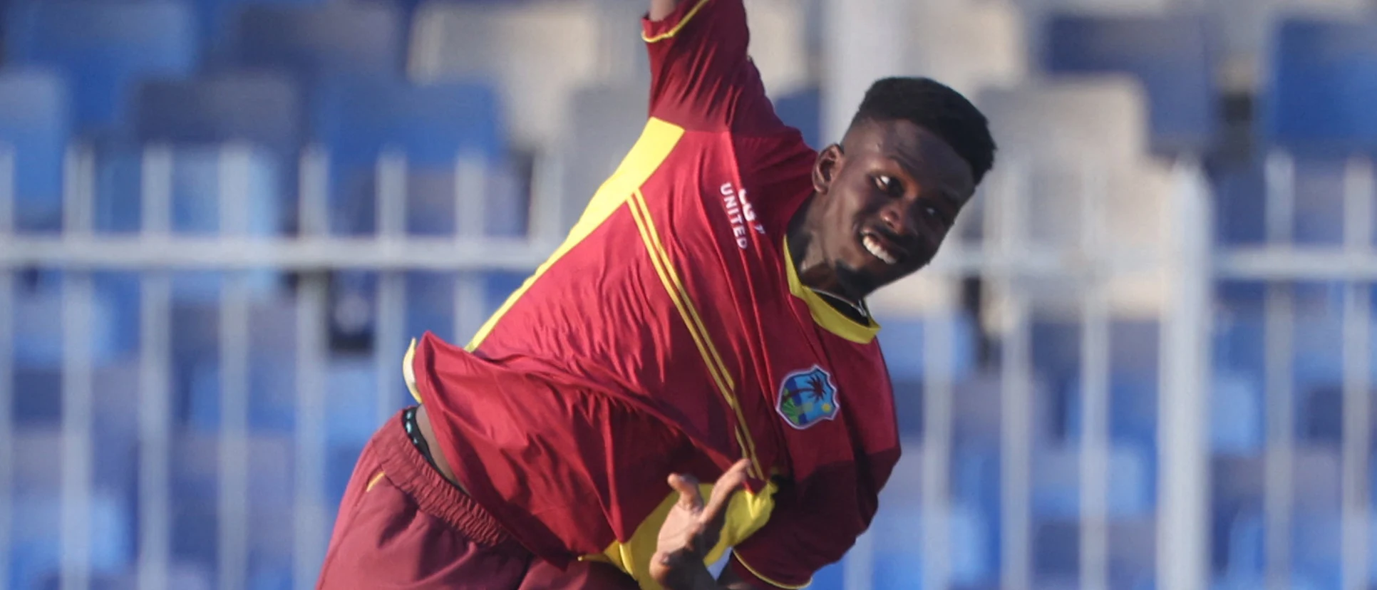 Logo of West Indies' Kevin Sinclair delivers a ball during the third one-day international cricket match between the United Arab Emirates and West Indies