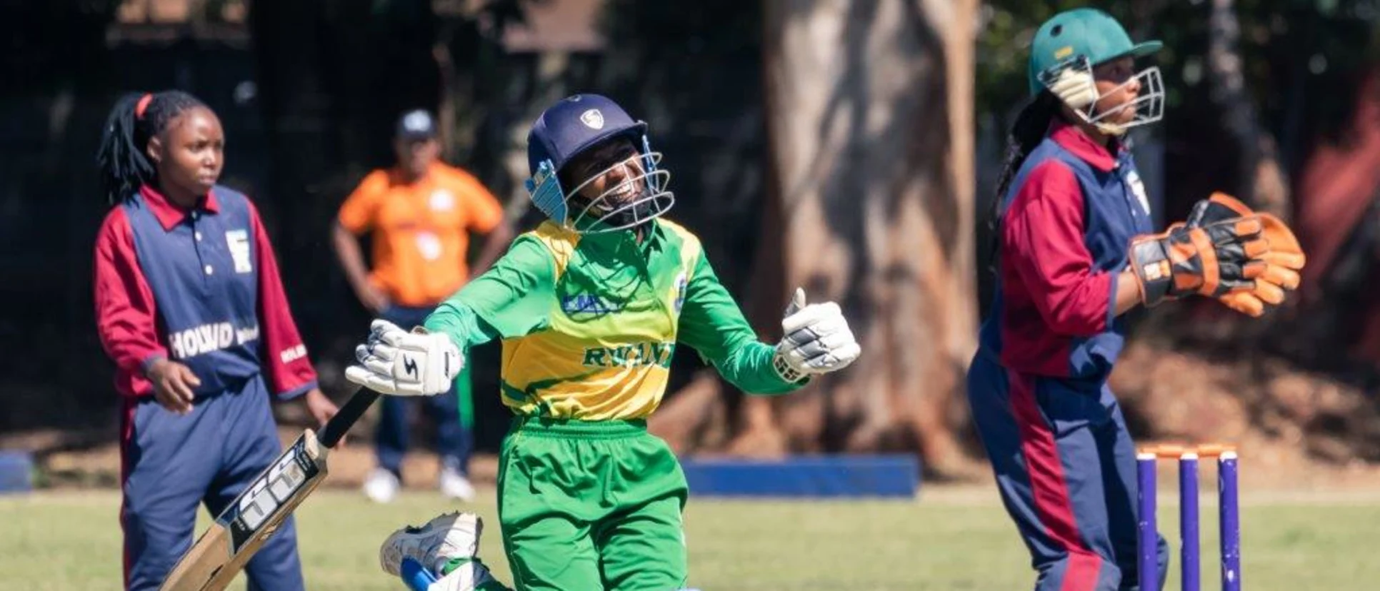 Logo of Rwanda batter Nyirankundineza celebrates