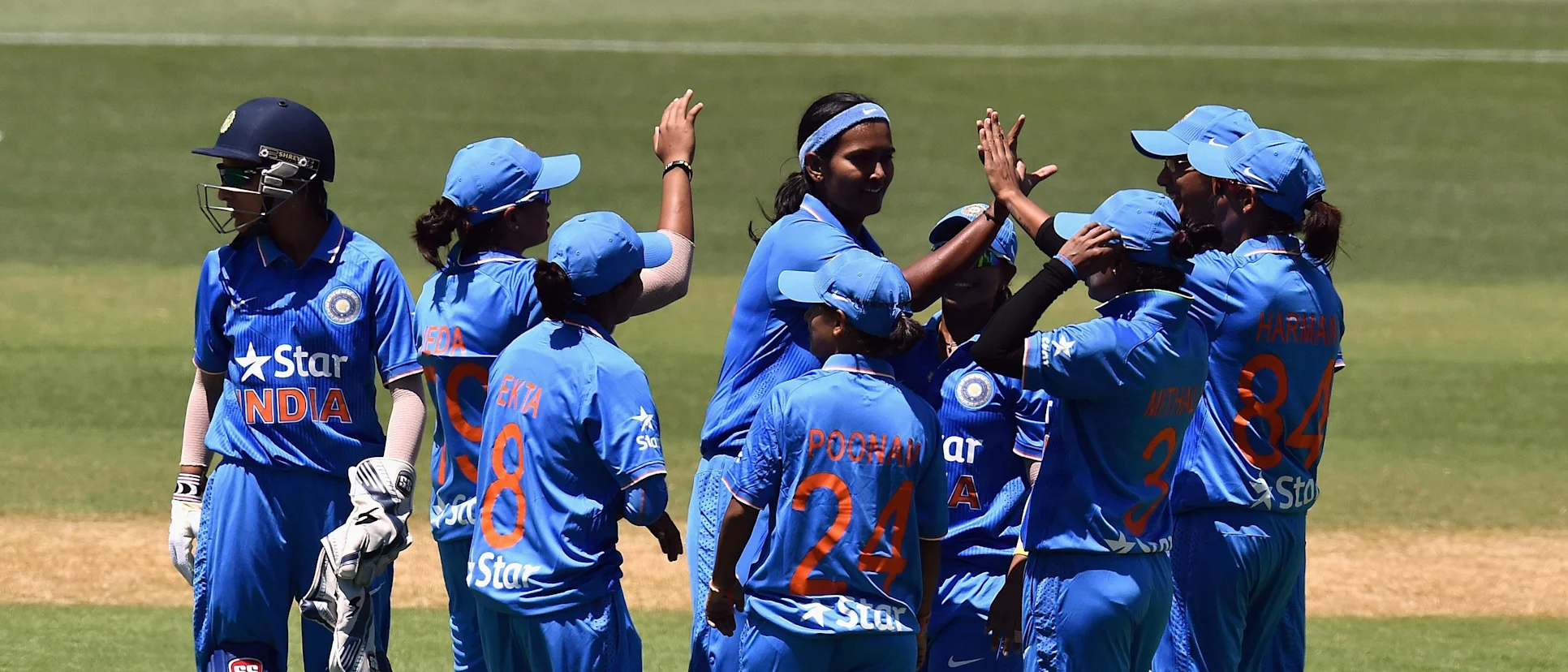 Logo of India Women's team celebrating