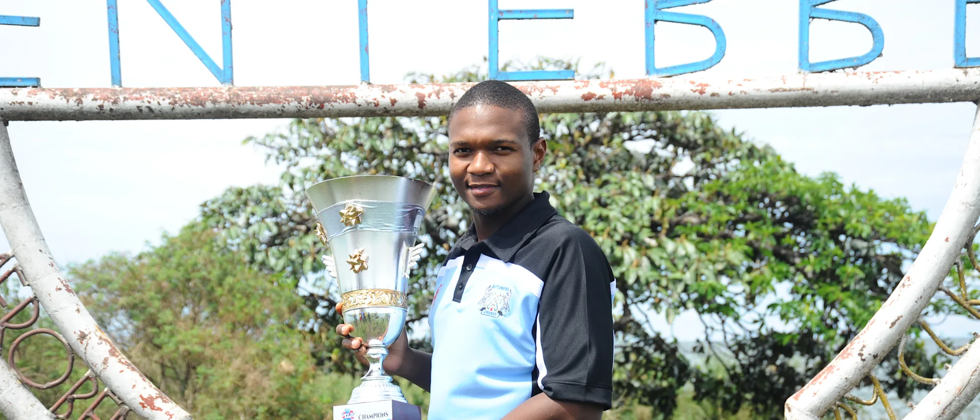Logo of Botswana captain Karabo Mothlanka with the ICC T20 World Cup Africa Final Qualifier trophy